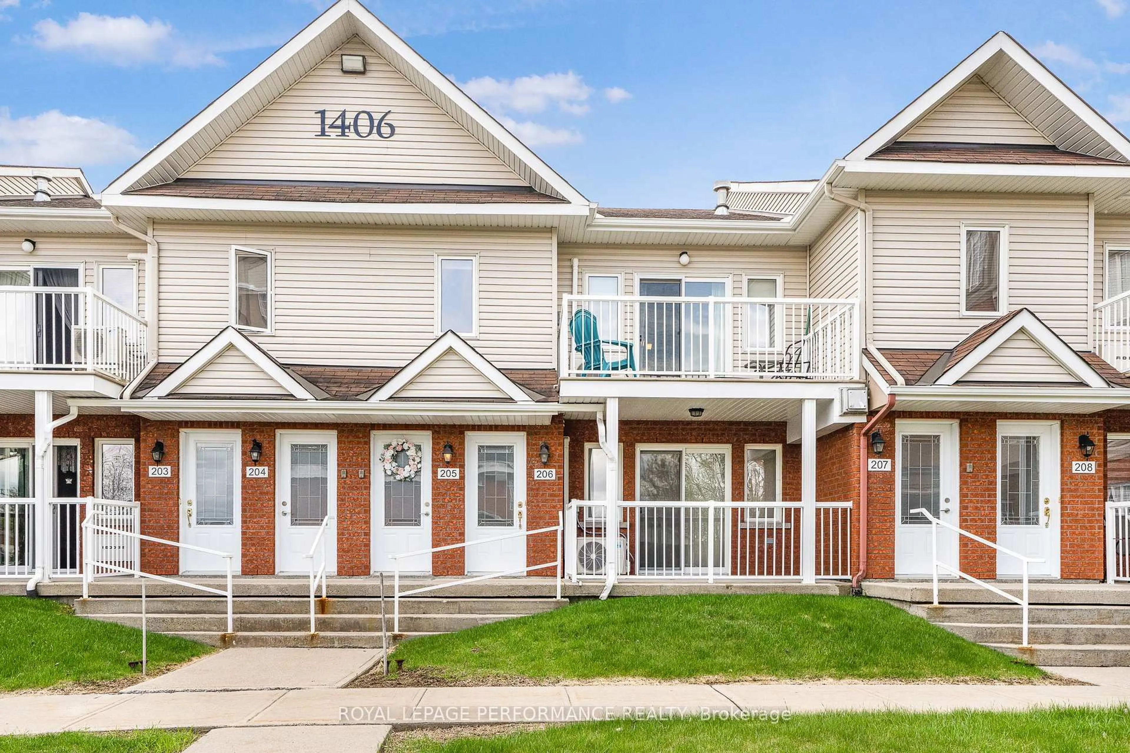 Home with vinyl exterior material, street for 1406 Clement St #205, Hawkesbury Ontario K6A 3V6
