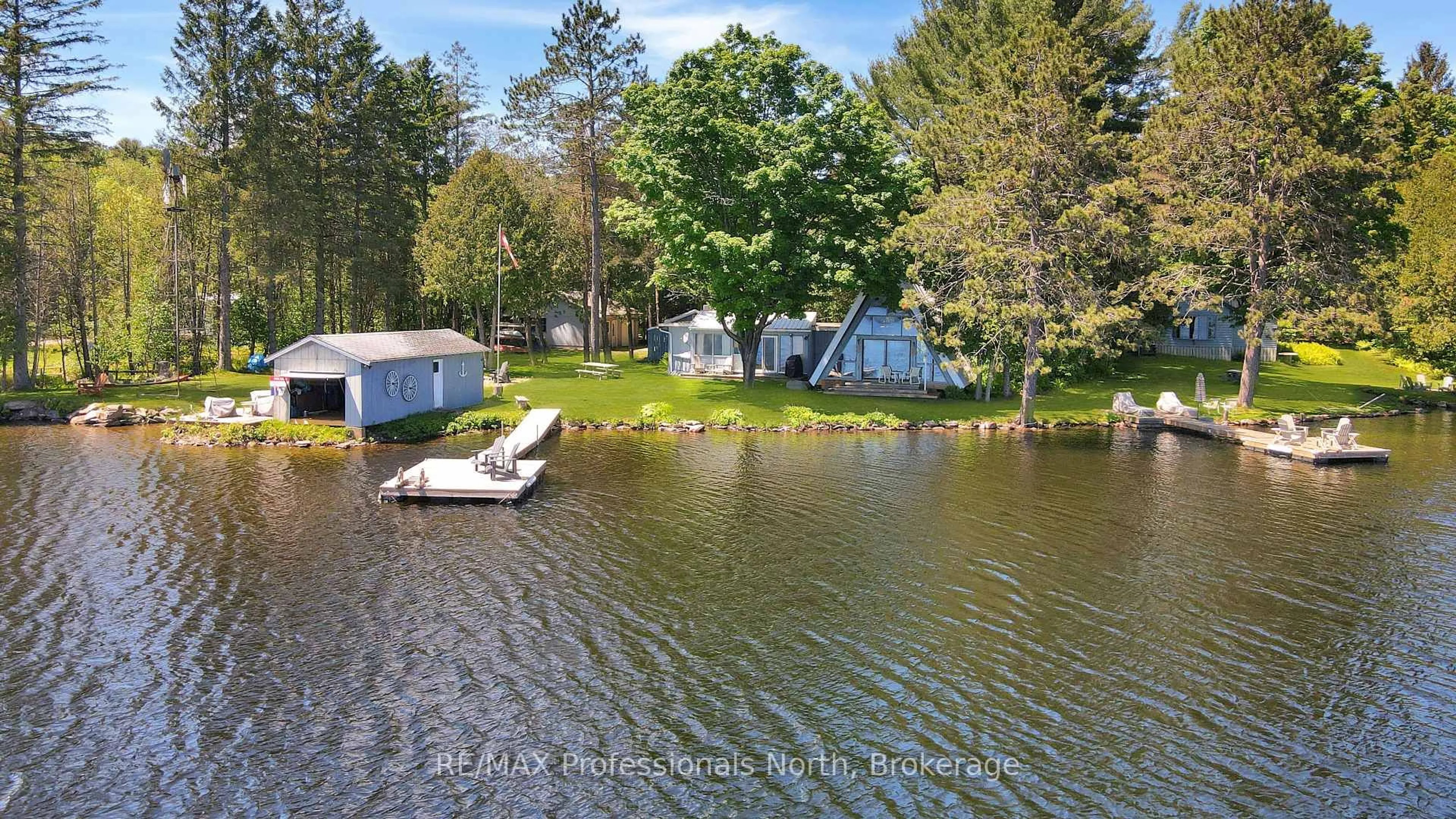 A pic from outside/outdoor area/front of a property/back of a property/a pic from drone, water/lake/river/ocean view for 1013 TWIN ROCKS Lane, Algonquin Highlands Ontario K0M 2K0