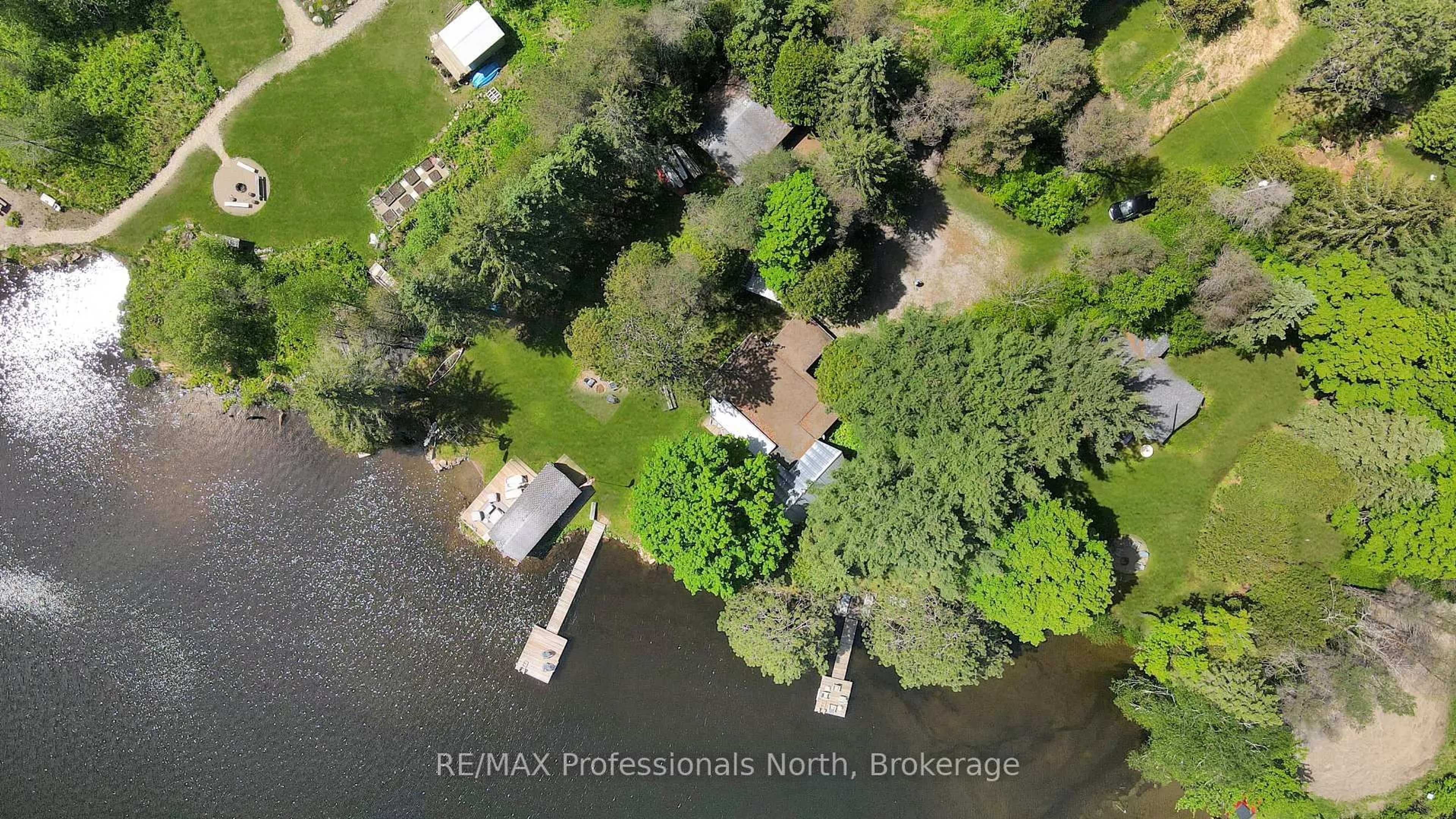 A pic from outside/outdoor area/front of a property/back of a property/a pic from drone, water/lake/river/ocean view for 1013 TWIN ROCKS Lane, Algonquin Highlands Ontario K0M 2K0