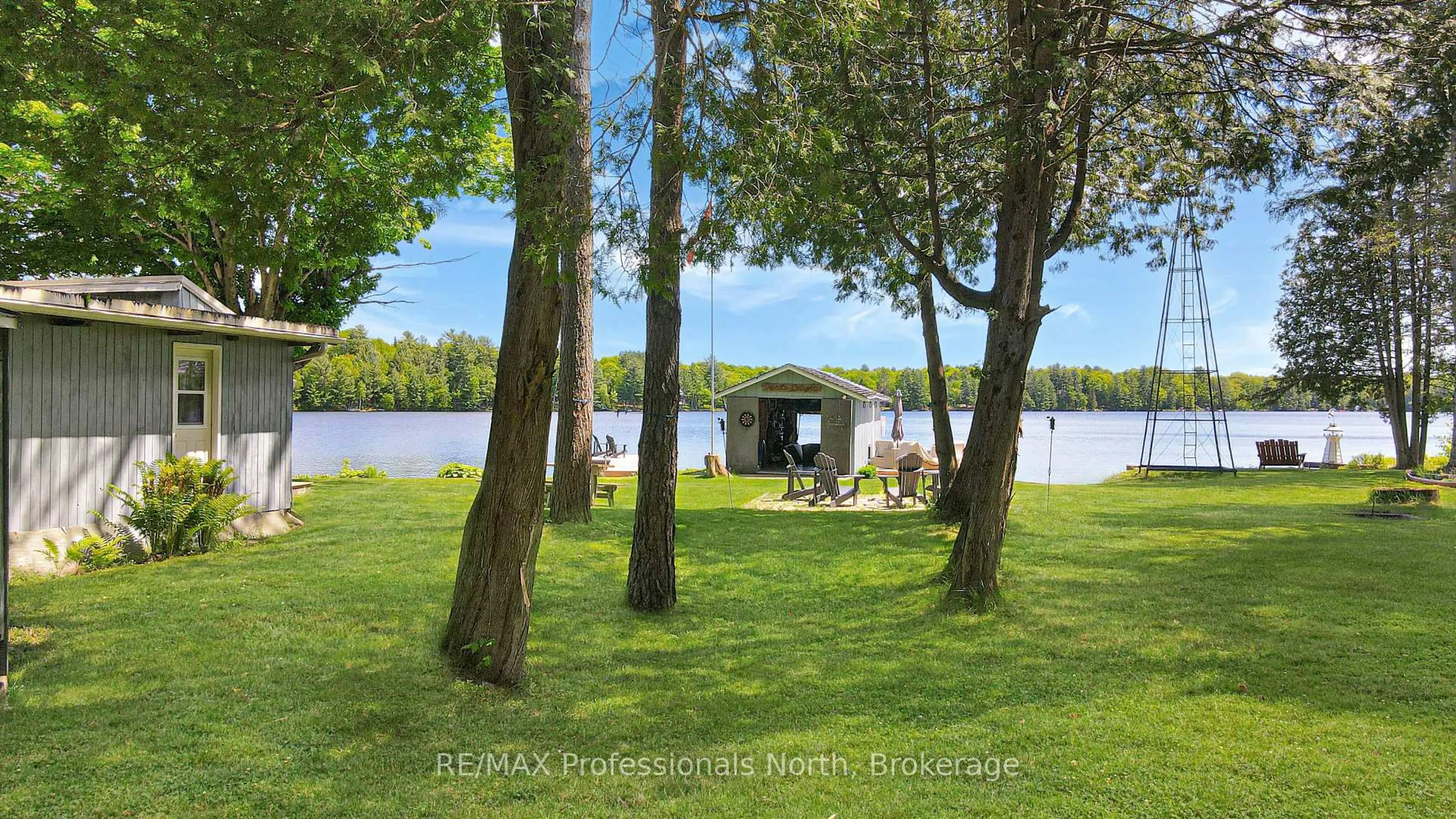A pic from outside/outdoor area/front of a property/back of a property/a pic from drone, water/lake/river/ocean view for 1013 TWIN ROCKS Lane, Algonquin Highlands Ontario K0M 2K0