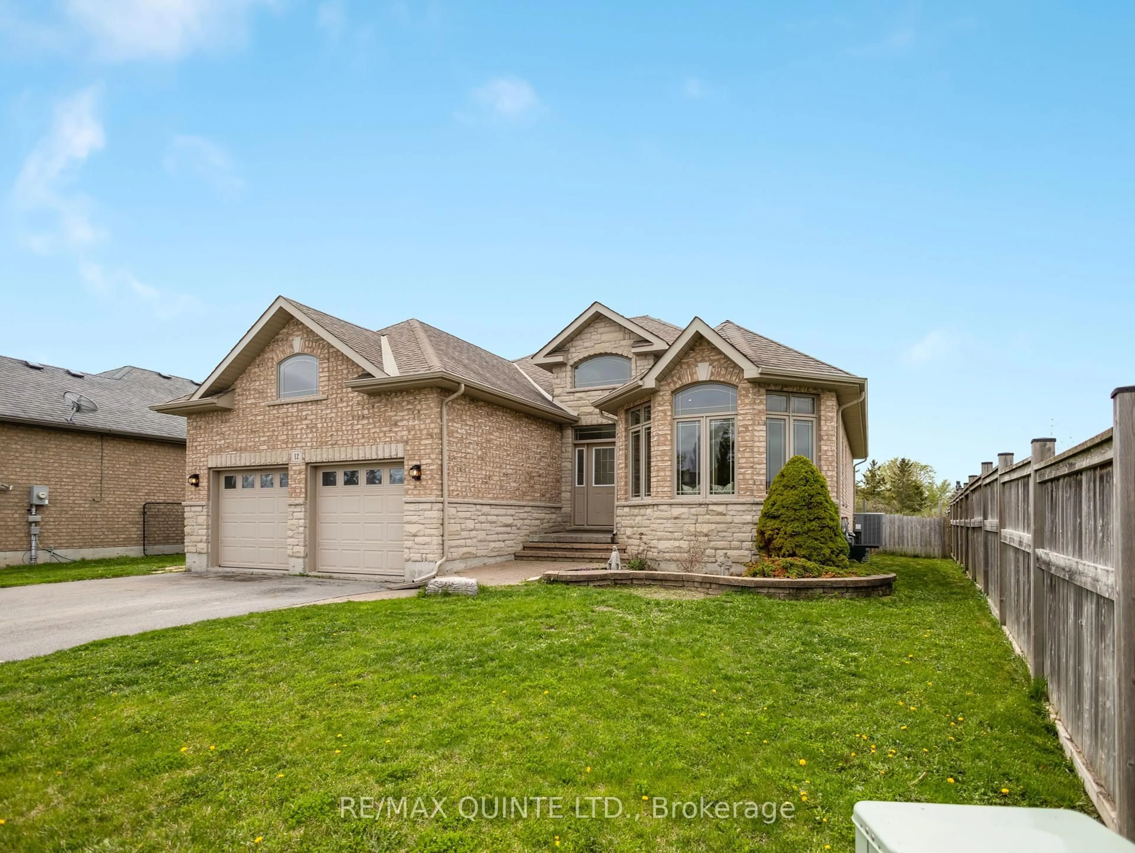 Home with brick exterior material, street for 12 Hampton Ridge Dr, Belleville Ontario K8N 0L6