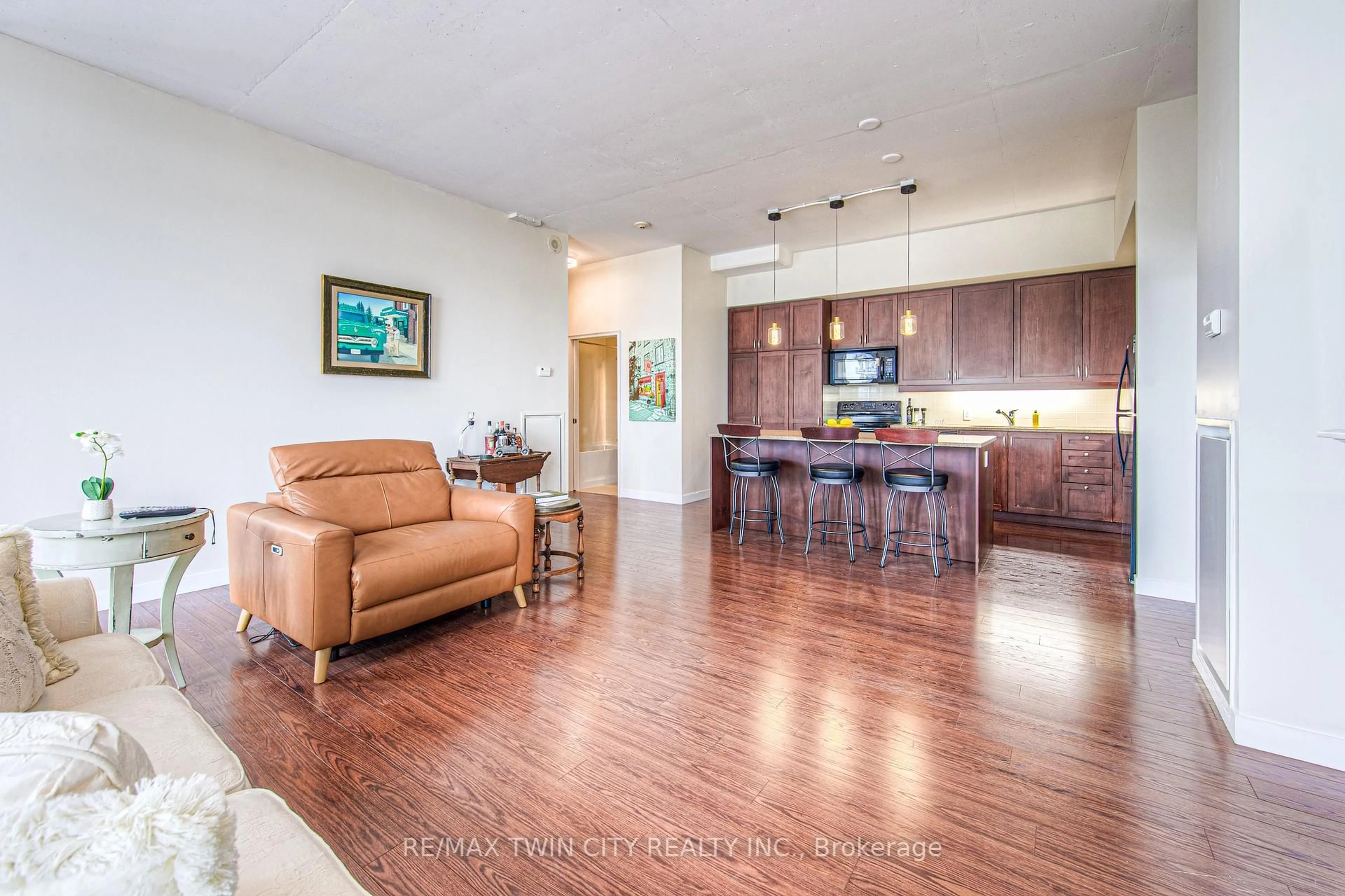 Open concept kitchen, wood/laminate floor for 191 KING St #713, Waterloo Ontario N2J 1R1
