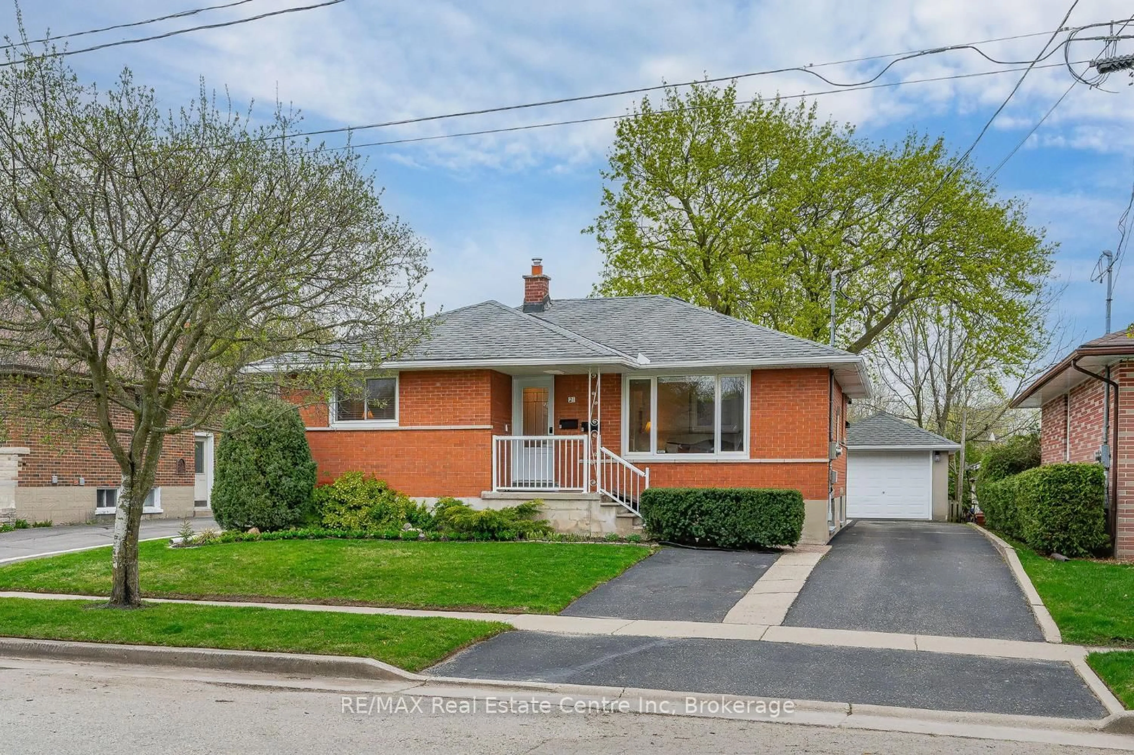 Home with brick exterior material, street for 21 NORMANDY Dr, Guelph Ontario N1E 2P3
