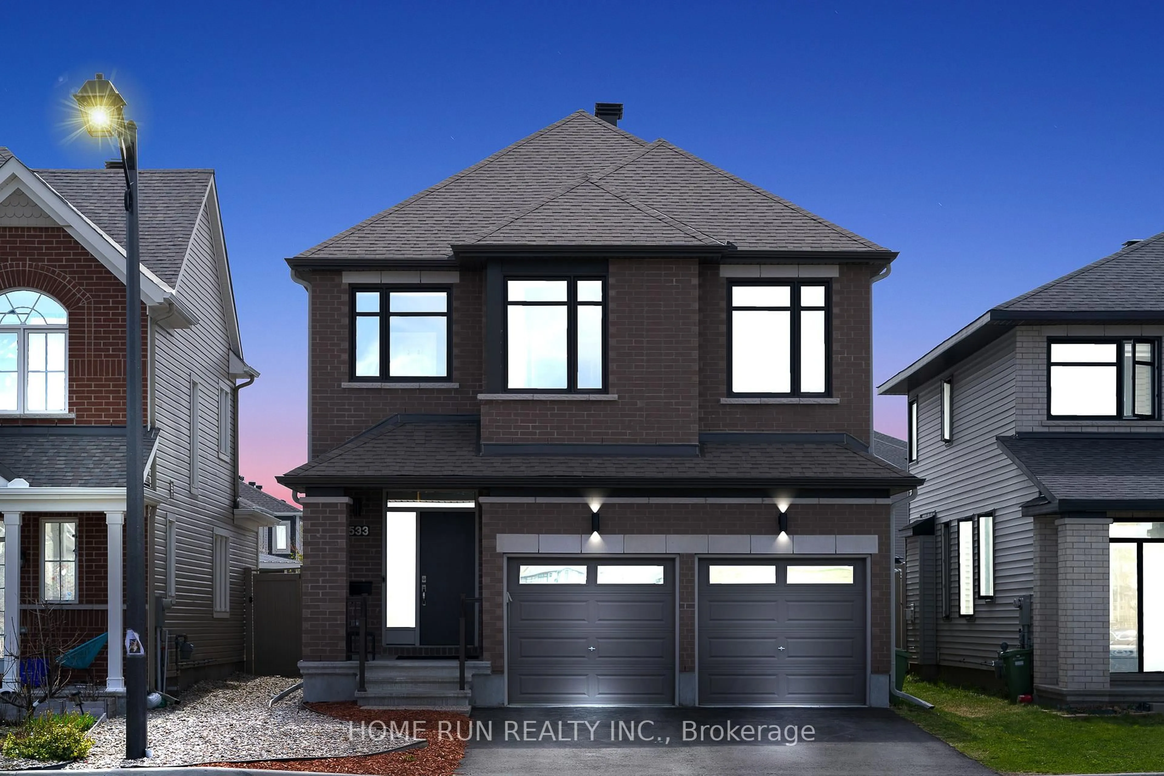 Home with brick exterior material, street for 533 Honeylocust Ave, Stittsville Ontario K2V 0L8