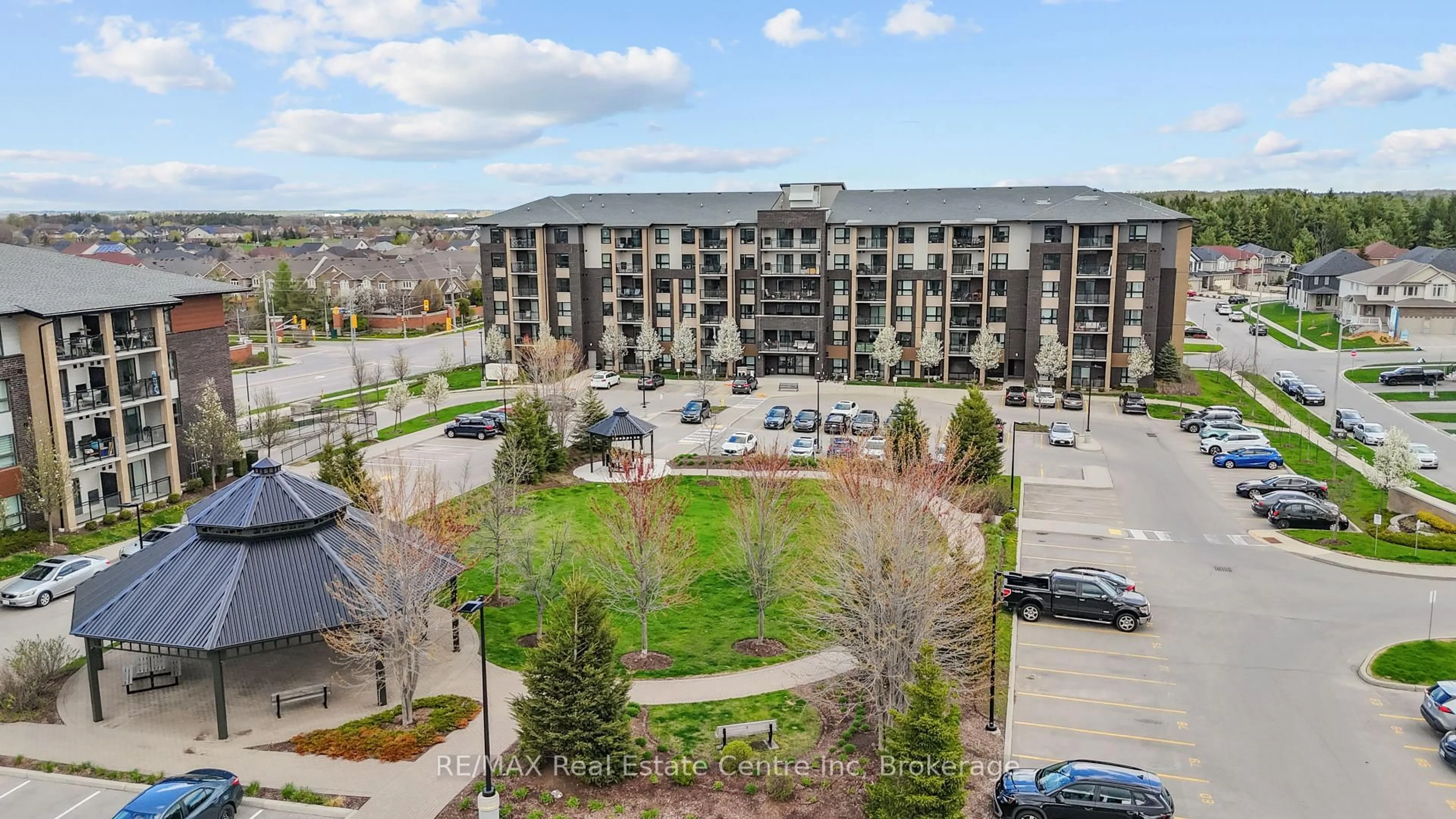 A pic from outside/outdoor area/front of a property/back of a property/a pic from drone, city buildings view from balcony for 25 Kay Cres #205, Guelph Ontario N1L 1L9