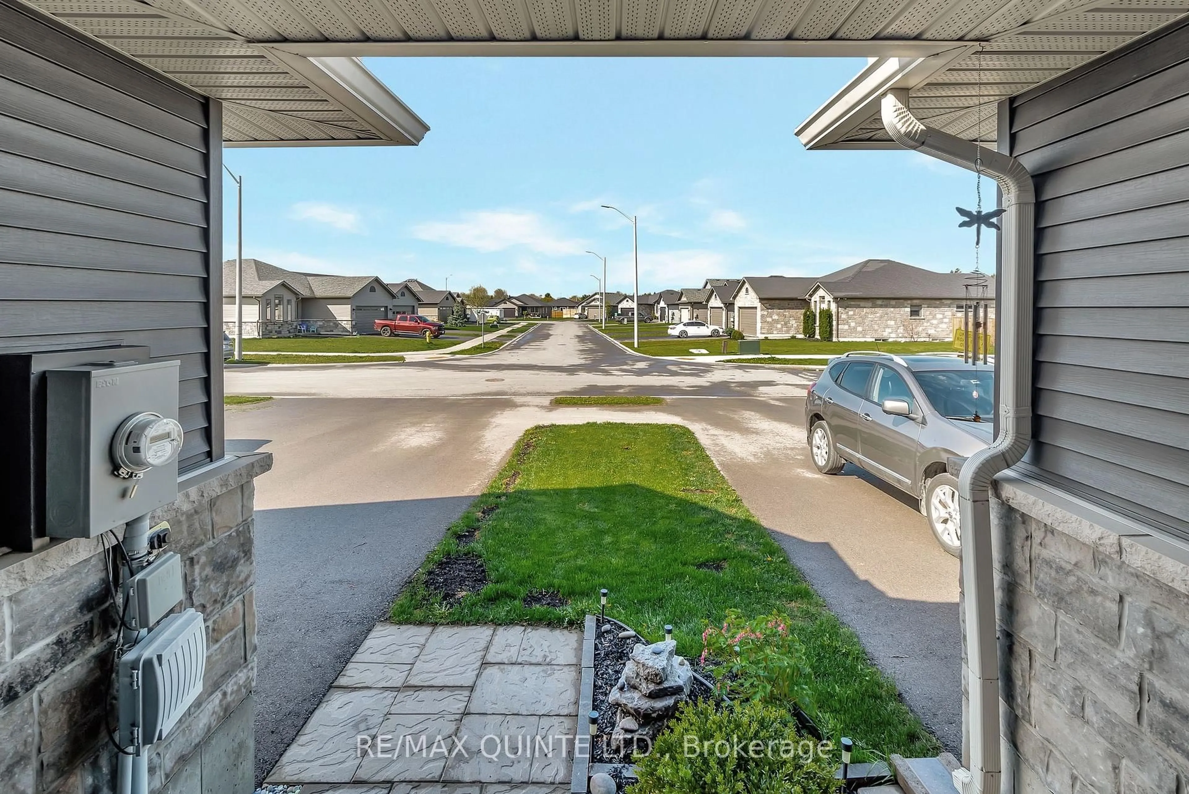 A pic from outside/outdoor area/front of a property/back of a property/a pic from drone, street for 49 Sandhu Cres, Belleville Ontario K8P 0G7