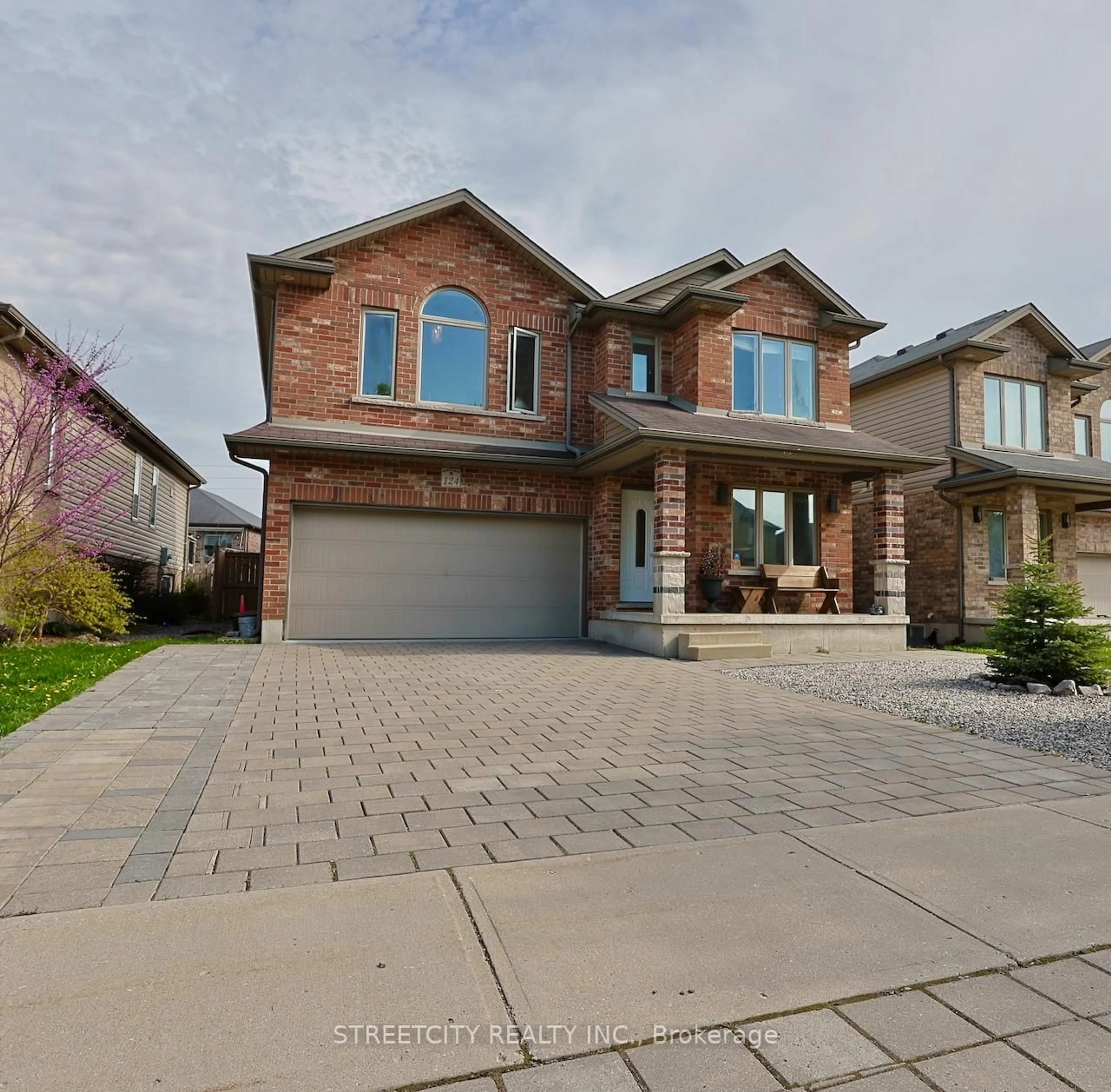 Home with brick exterior material, street for 124 Tanoak Dr, London North Ontario N6G 5R3