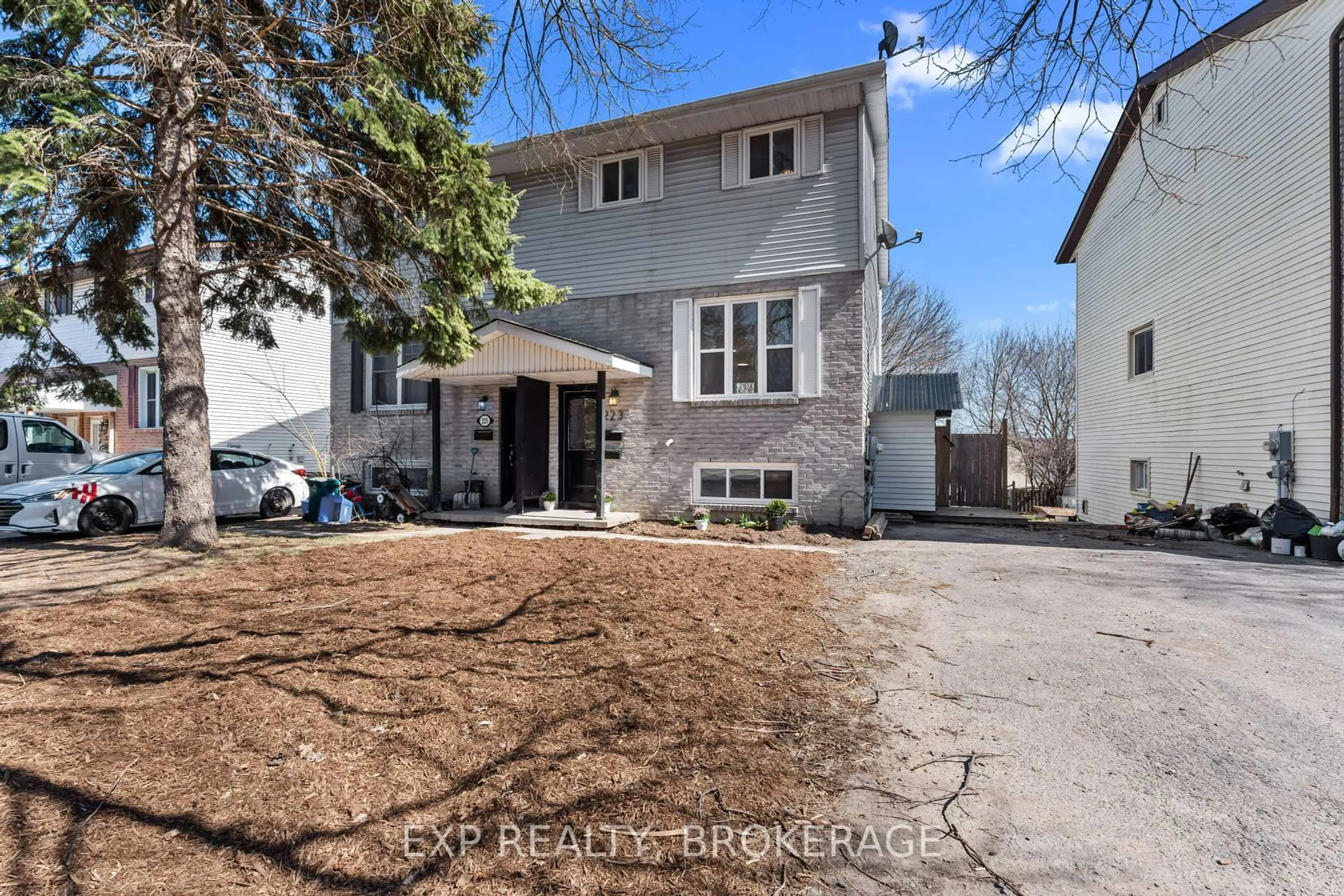 Home with brick exterior material, street for 223 GUTHRIE Dr, Kingston Ontario K7K 6V6