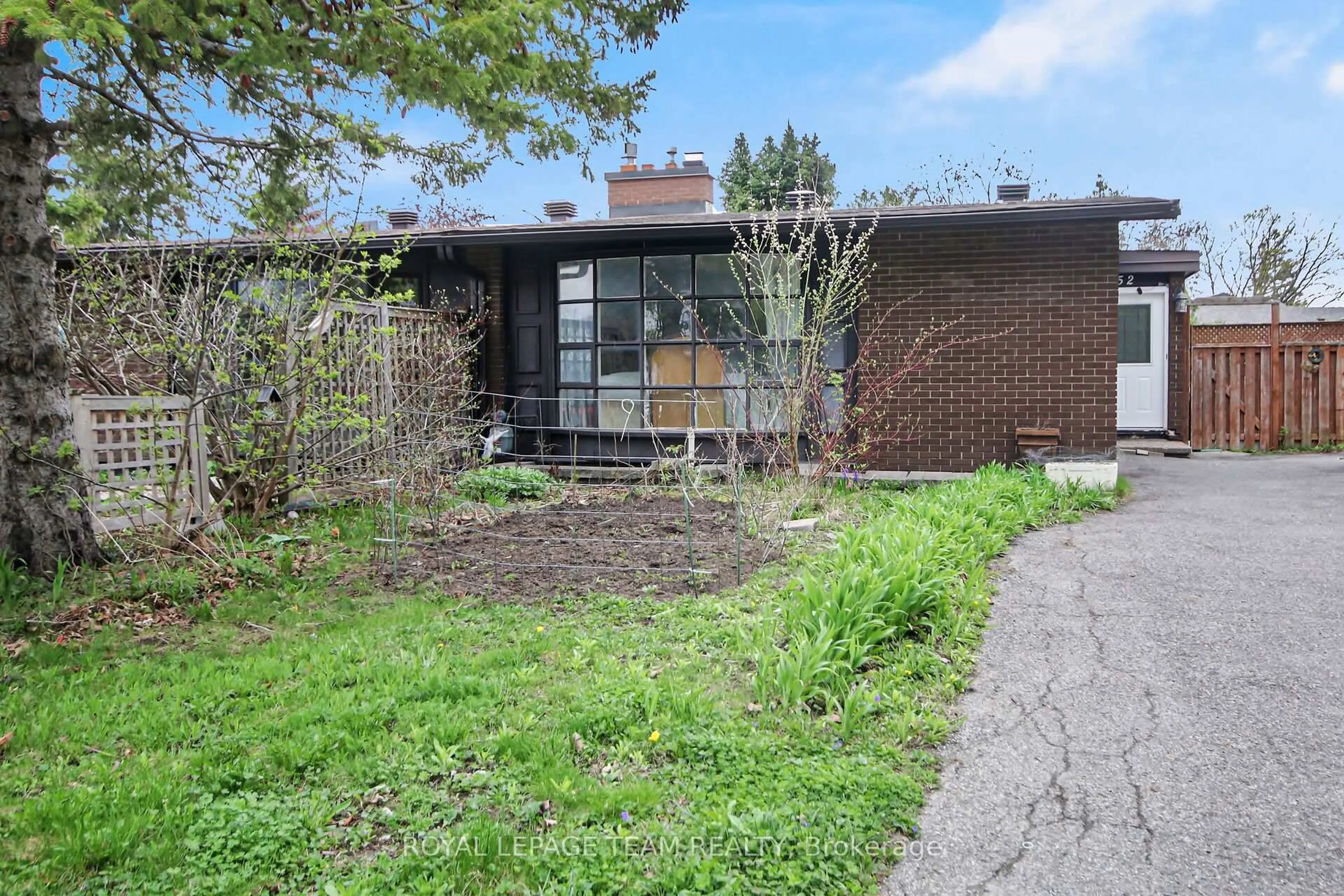 Home with brick exterior material, street for 52 Bowhill Ave, Ottawa Ontario K2E 6S7