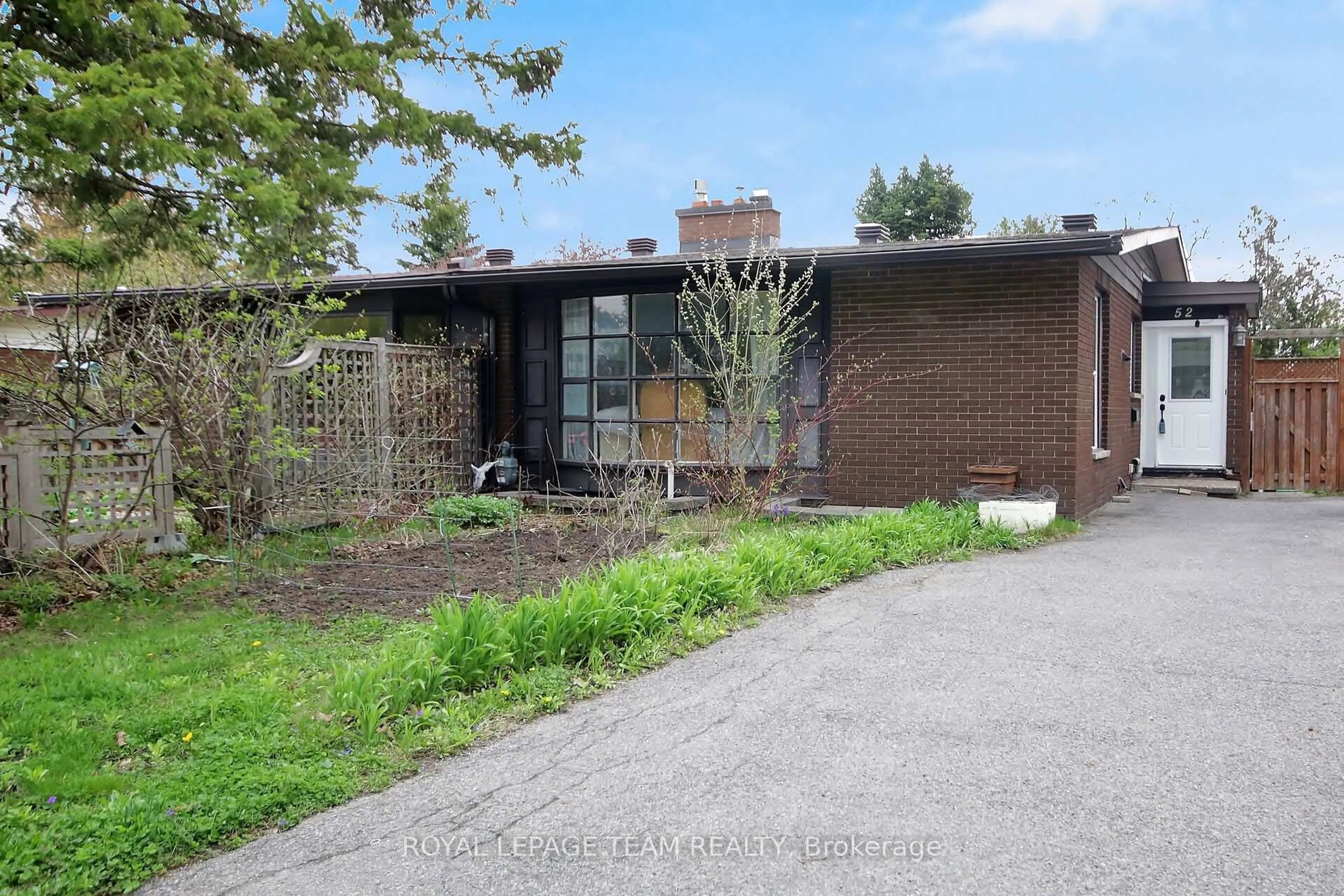 Home with brick exterior material, street for 52 Bowhill Ave, Ottawa Ontario K2E 6S7