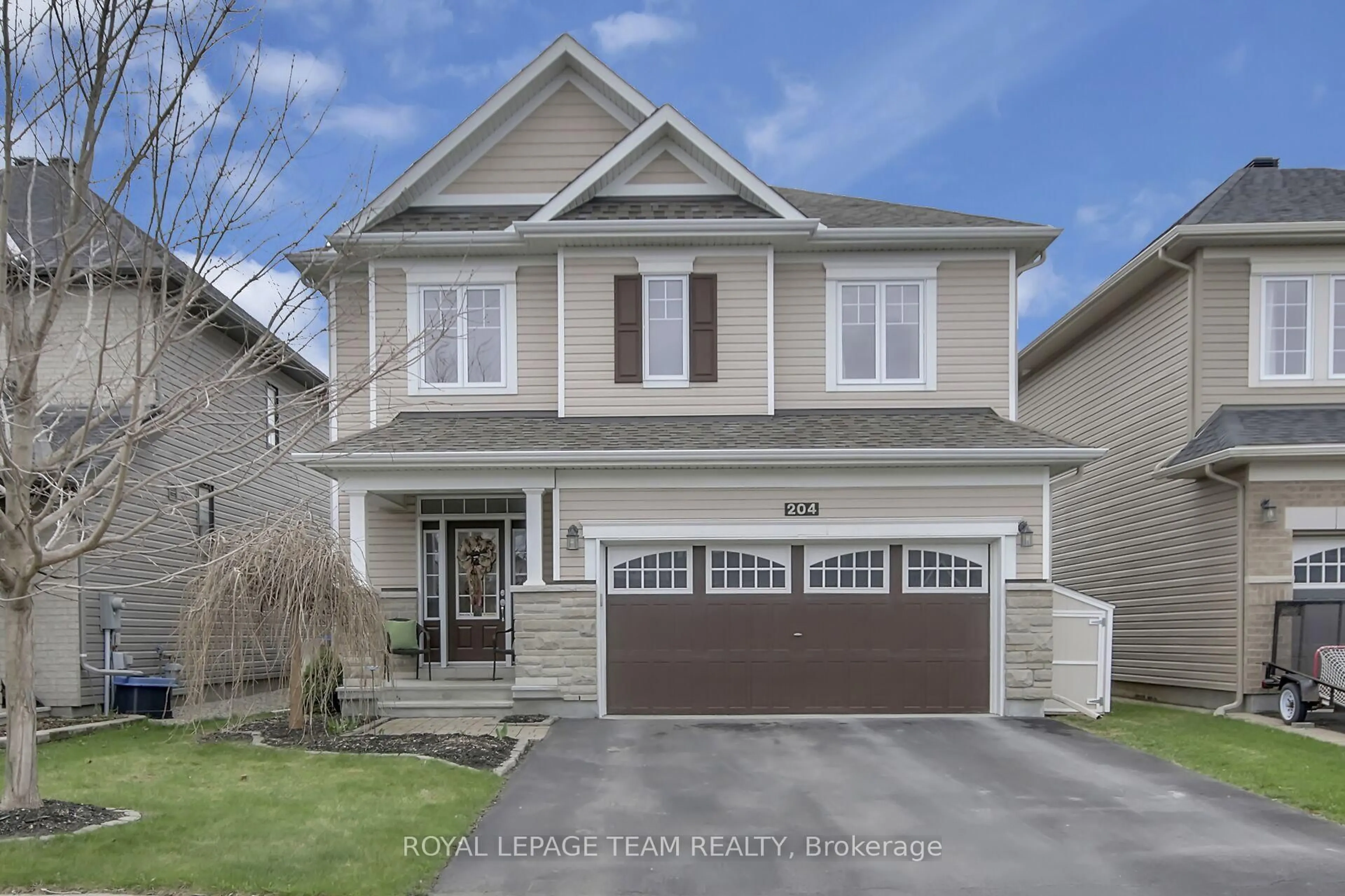 Home with vinyl exterior material, street for 204 Piazza Circ, Ottawa Ontario K2J 5S2