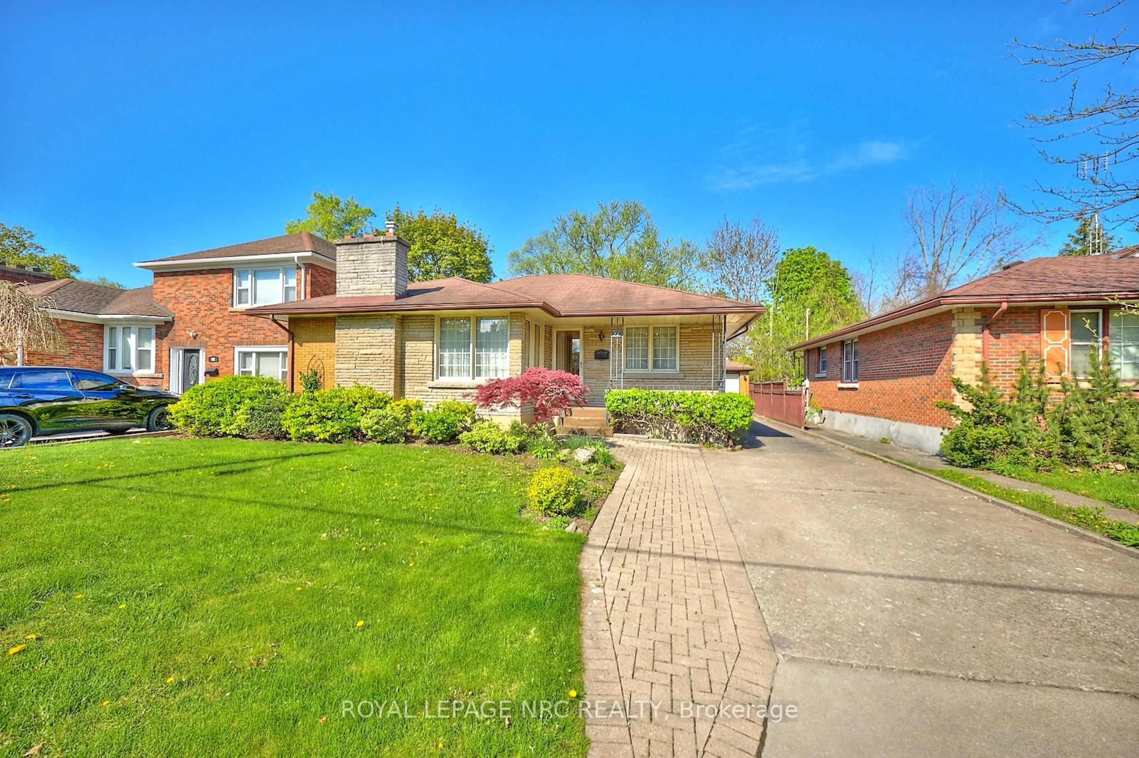 Home with brick exterior material, street for 90 Glenridge Ave, St. Catharines Ontario L2R 4X3