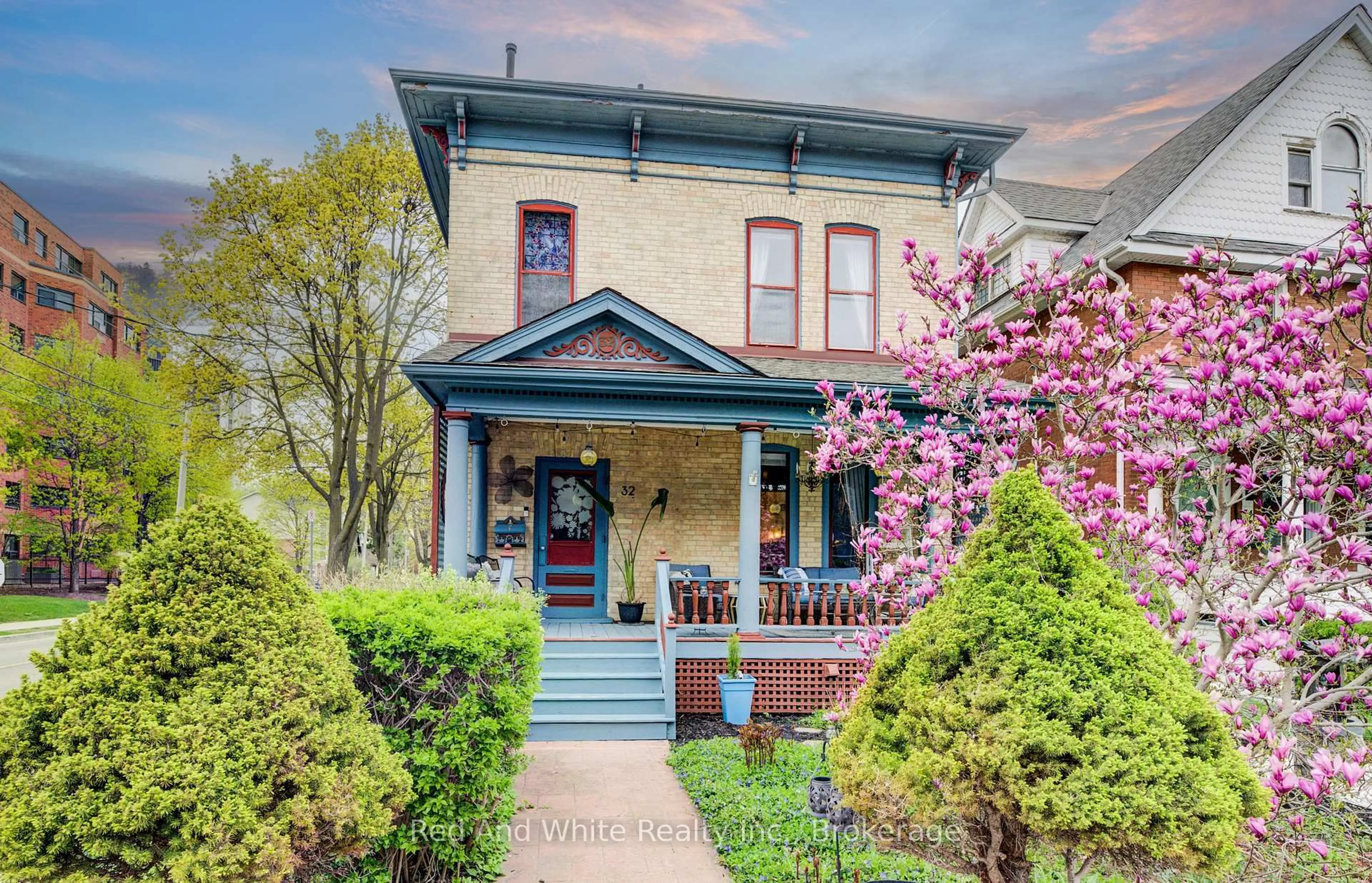 Home with brick exterior material, street for 32 Ellen St, Kitchener Ontario N2H 1L4