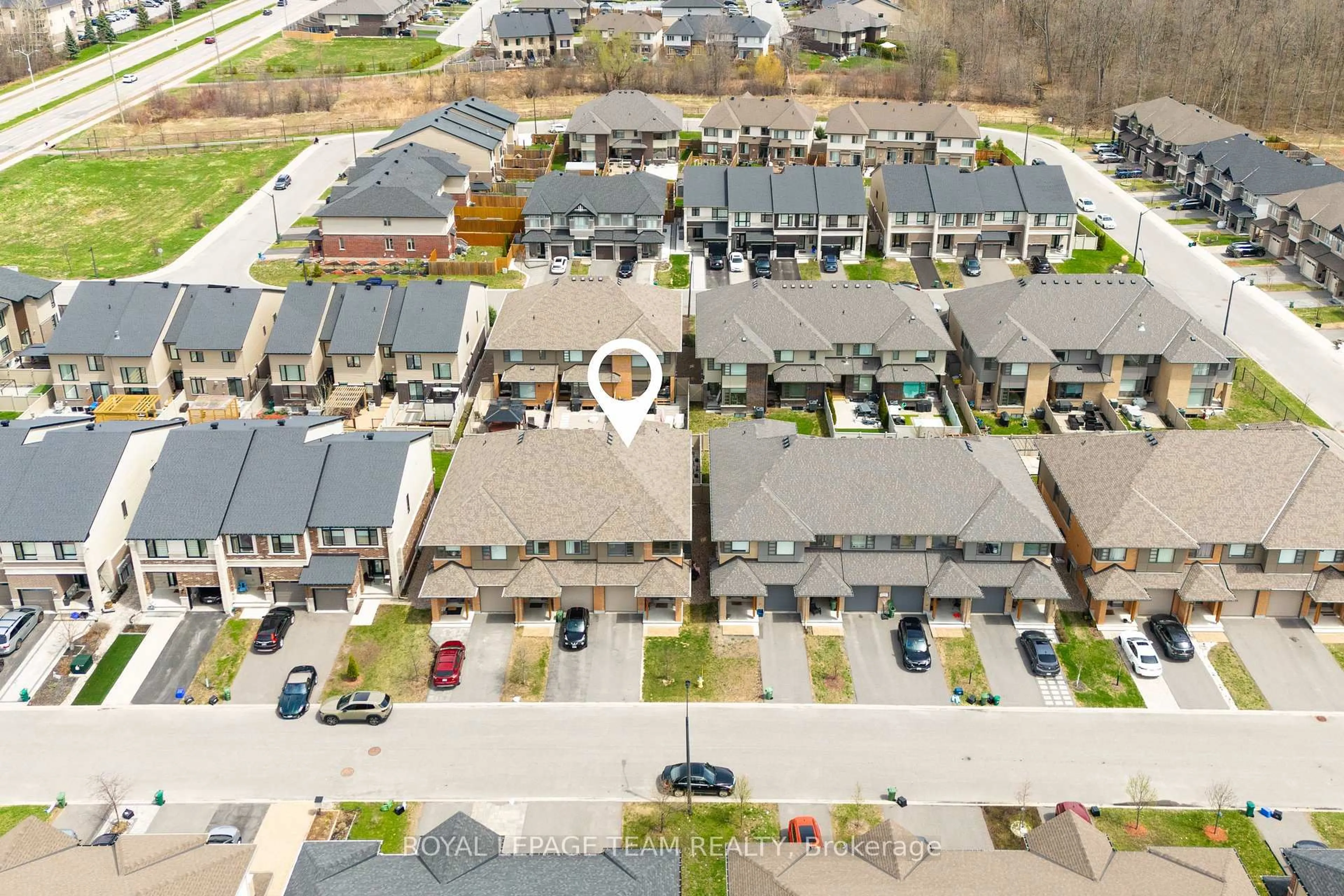 A pic from outside/outdoor area/front of a property/back of a property/a pic from drone, street for 713 Guardian Grve, Ottawa Ontario K4M 0E2