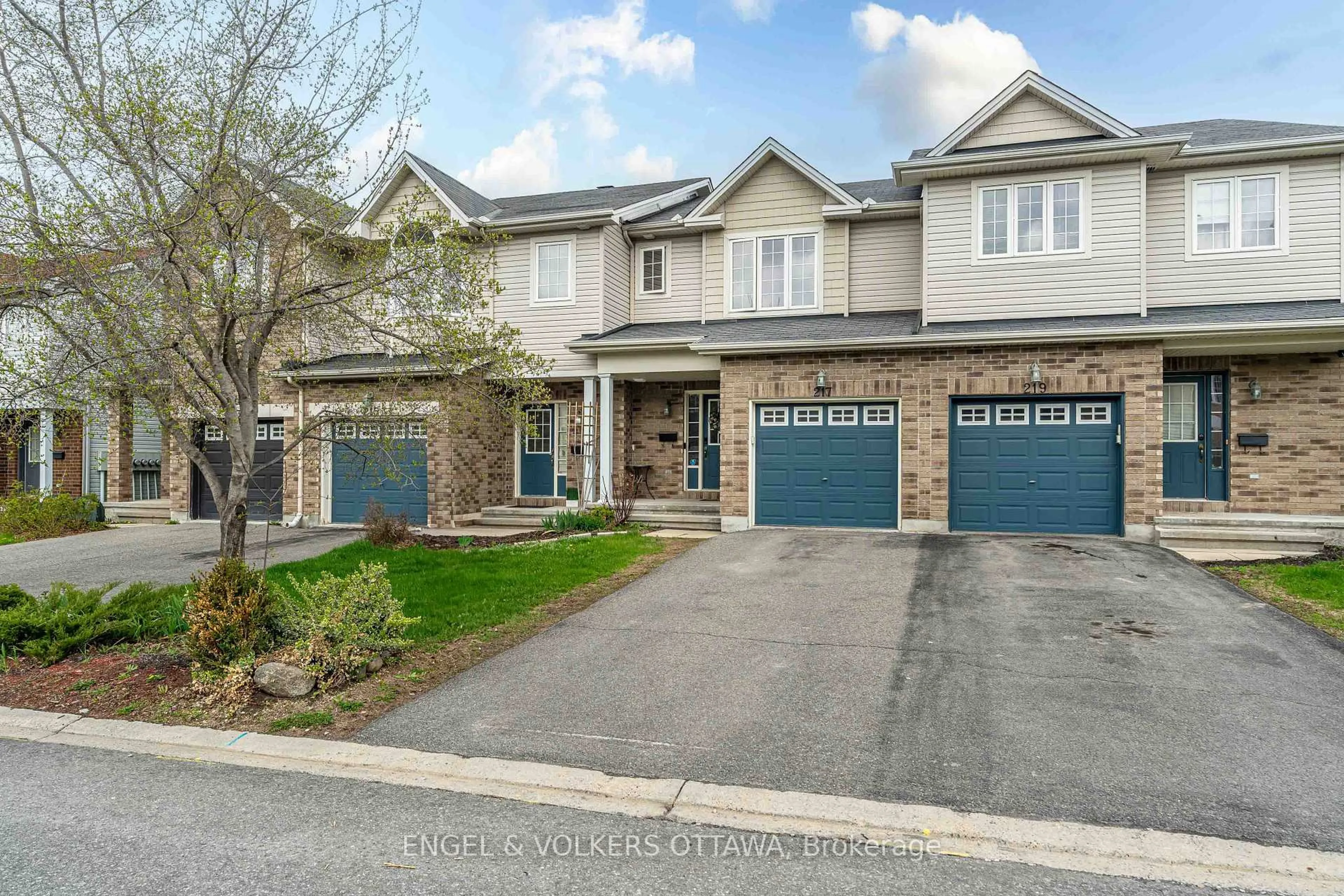 Home with brick exterior material, street for 217 Rolling Meadow Cres, Orleans Ontario K1W 0B1