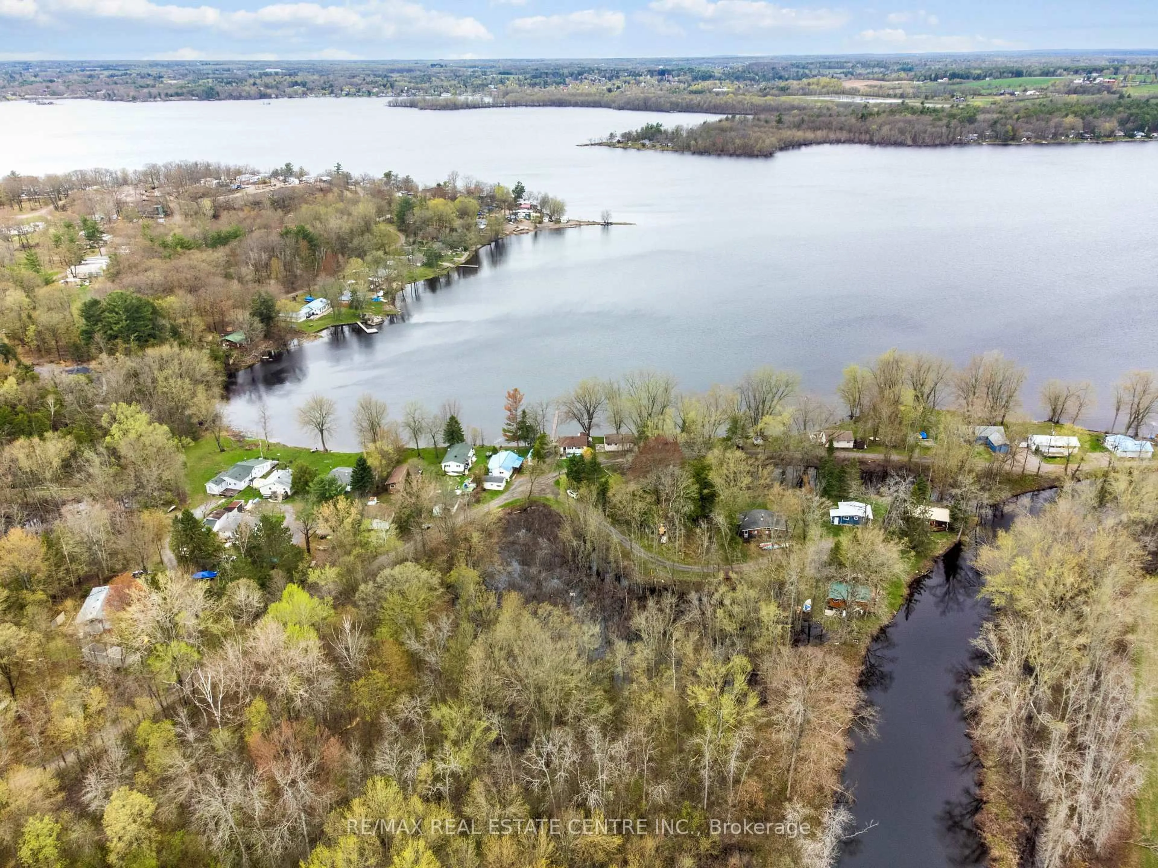 A pic from outside/outdoor area/front of a property/back of a property/a pic from drone, water/lake/river/ocean view for 105 Hughes Lane, Tweed Ontario K0K 3J0
