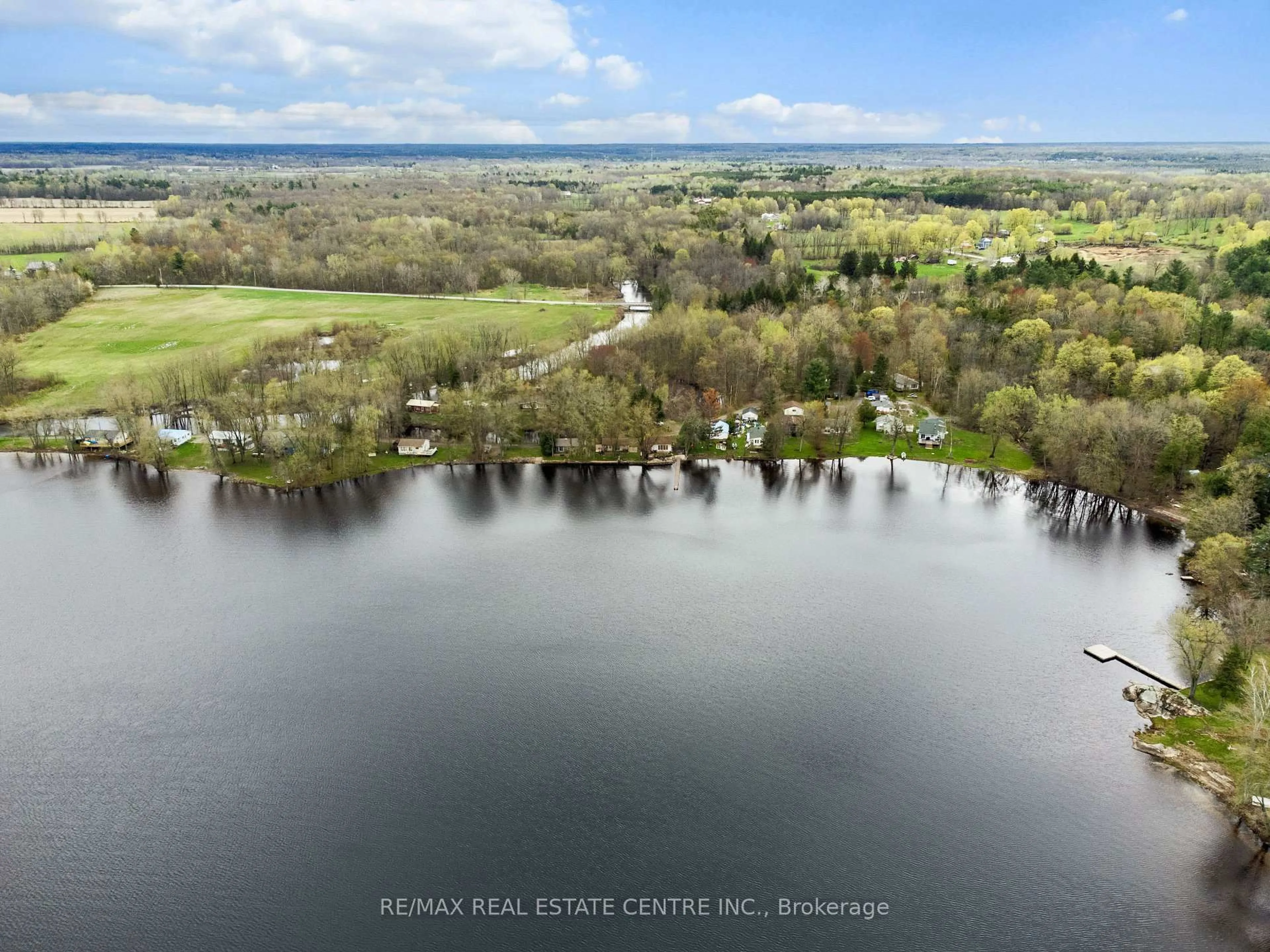 A pic from outside/outdoor area/front of a property/back of a property/a pic from drone, water/lake/river/ocean view for 105 Hughes Lane, Tweed Ontario K0K 3J0