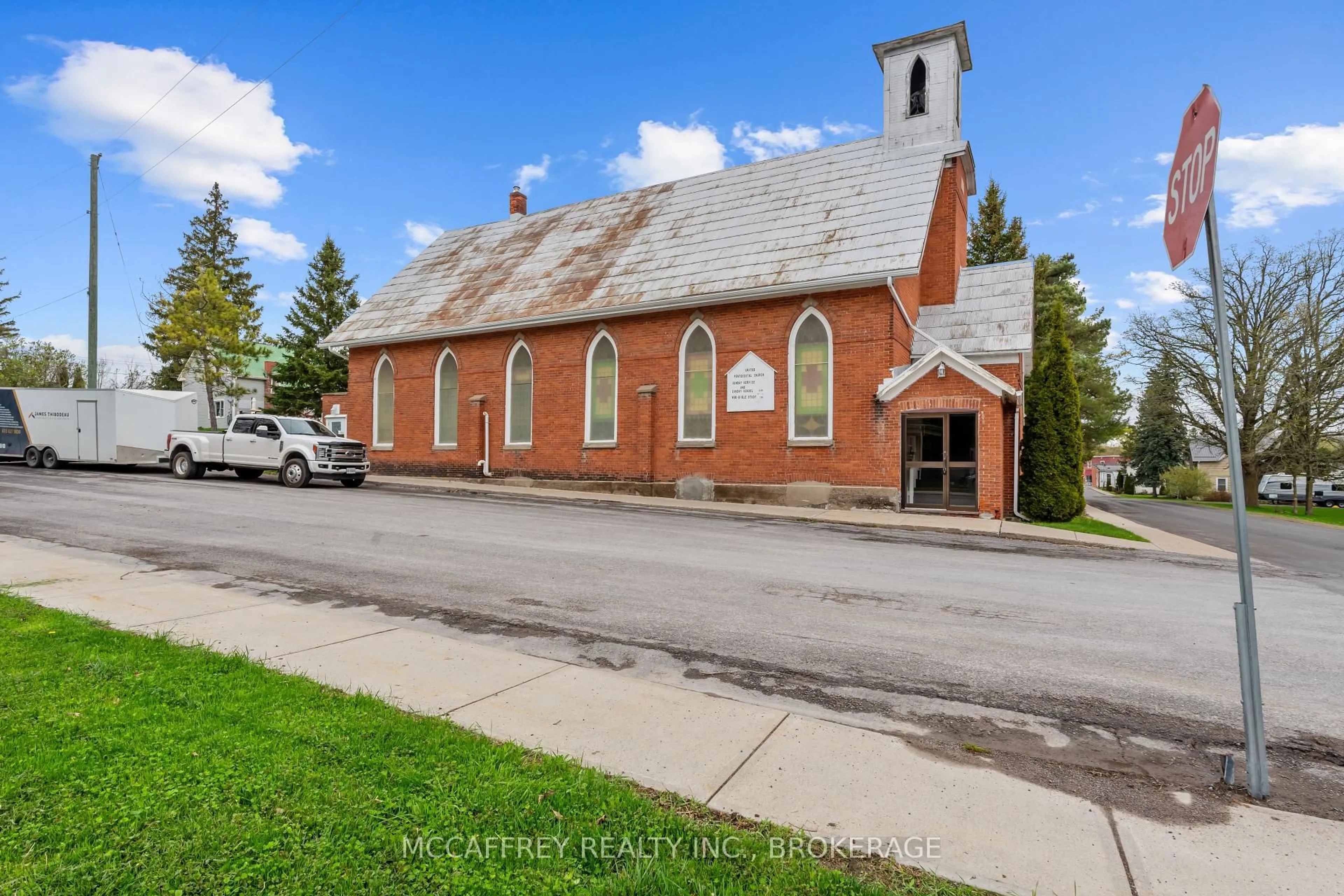 A pic from outside/outdoor area/front of a property/back of a property/a pic from drone, street for 4 Neely St, Tamworth Ontario K0K 3G0