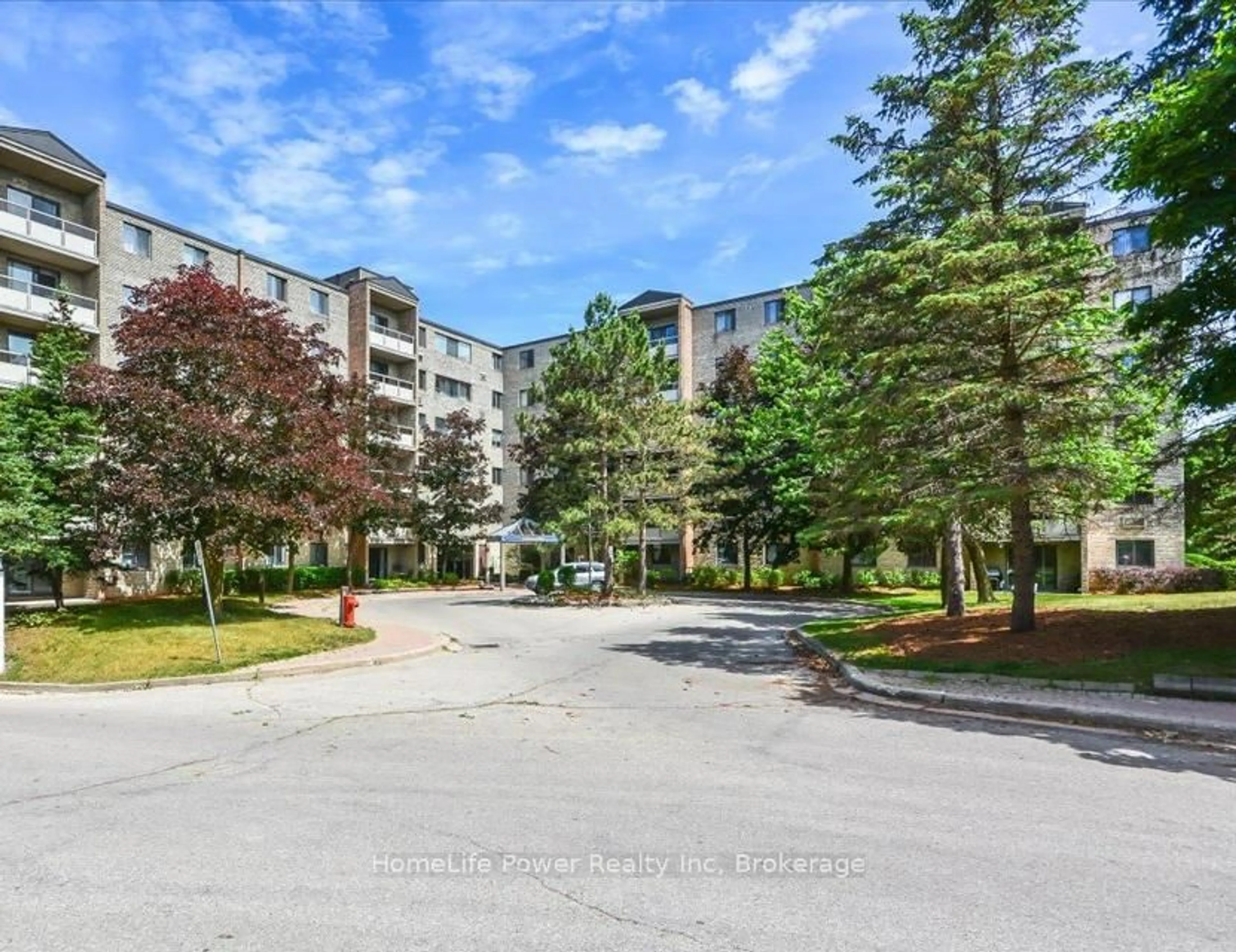 A pic from outside/outdoor area/front of a property/back of a property/a pic from drone, street for 93 Westwood Rd #307, Guelph Ontario N1H 7J7