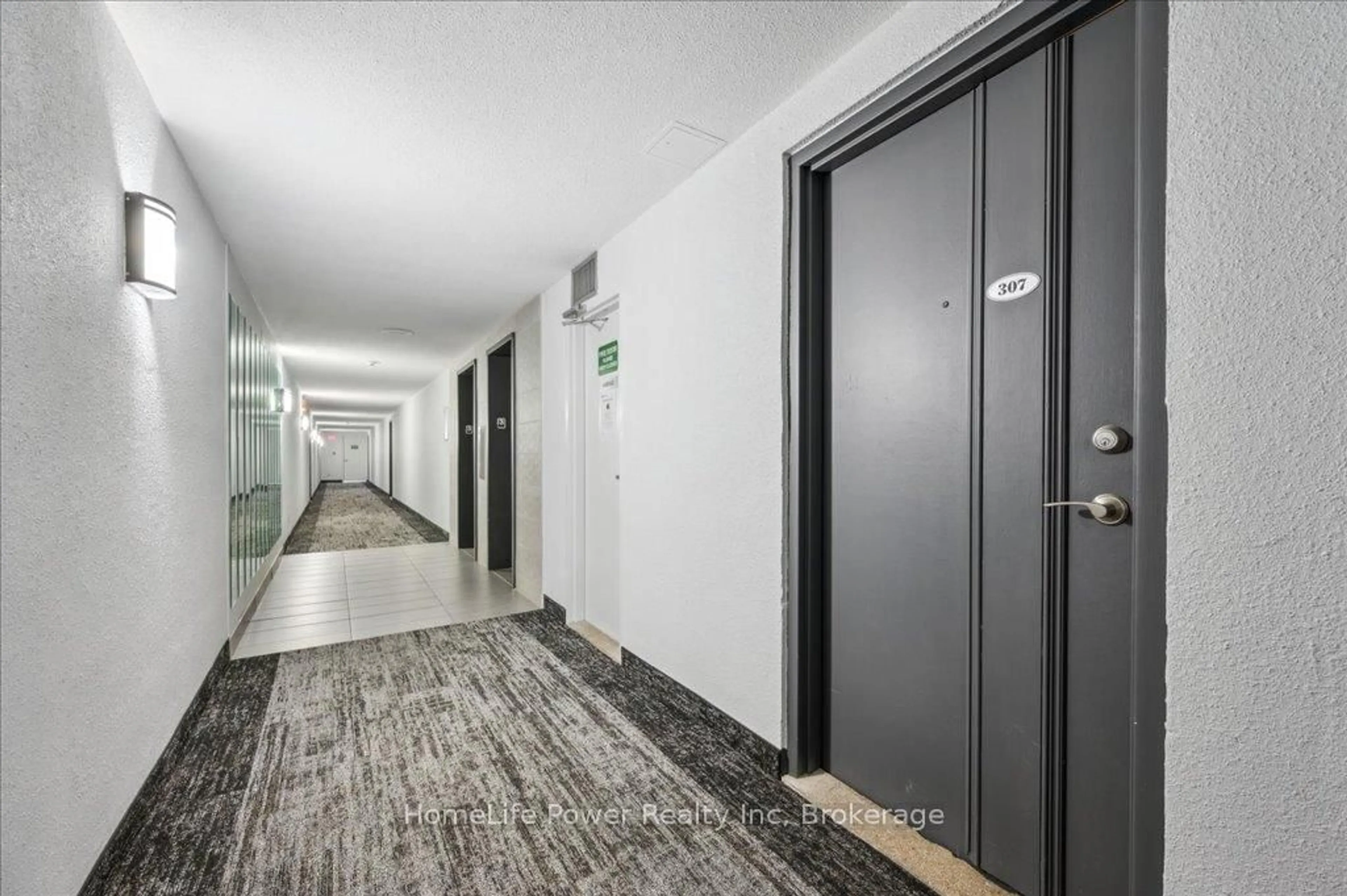 Indoor foyer for 93 Westwood Rd #307, Guelph Ontario N1H 7J7