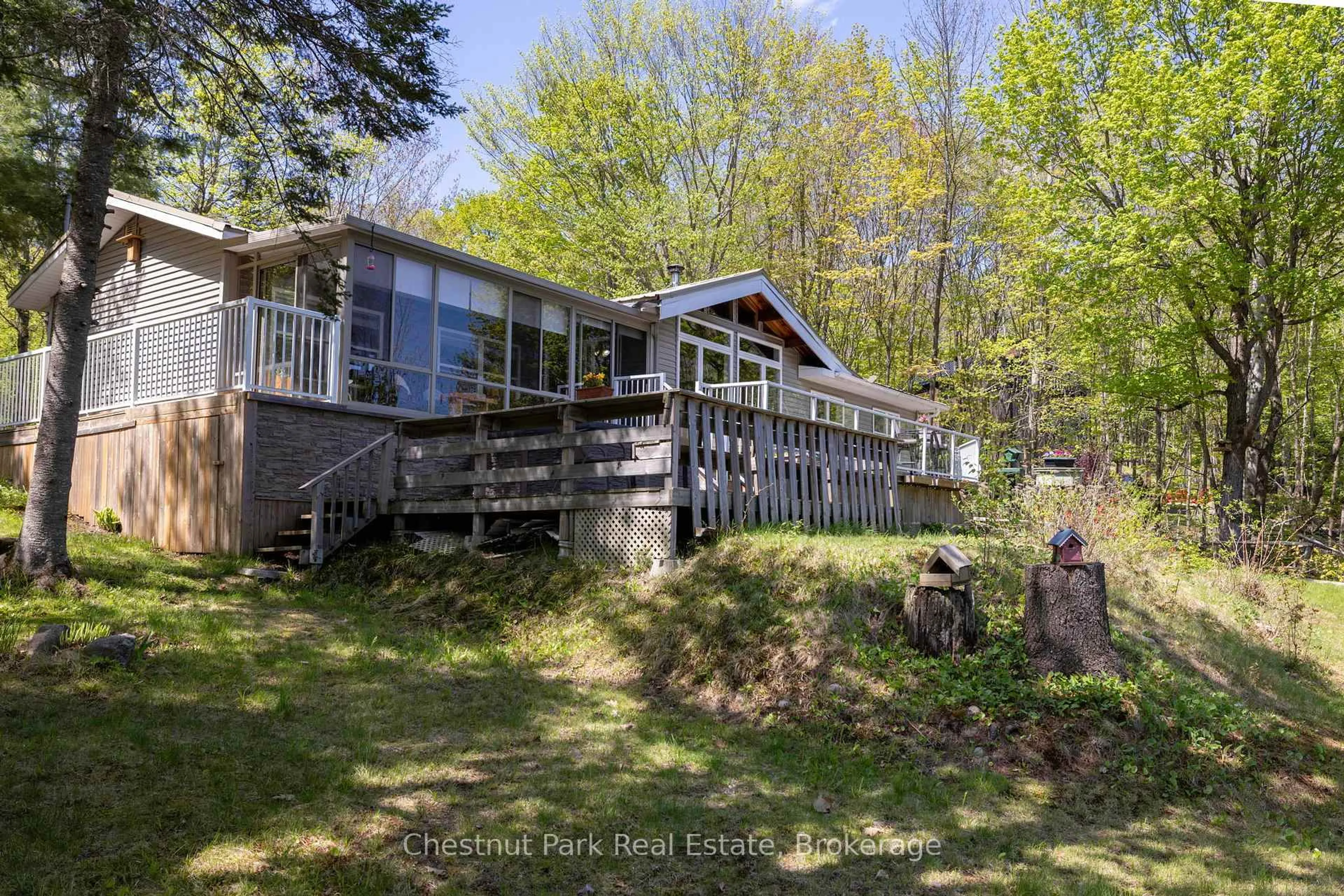 A pic from outside/outdoor area/front of a property/back of a property/a pic from drone, water/lake/river/ocean view for 1260 Winders Bay Rd, Lake of Bays Ontario P0B 1A0
