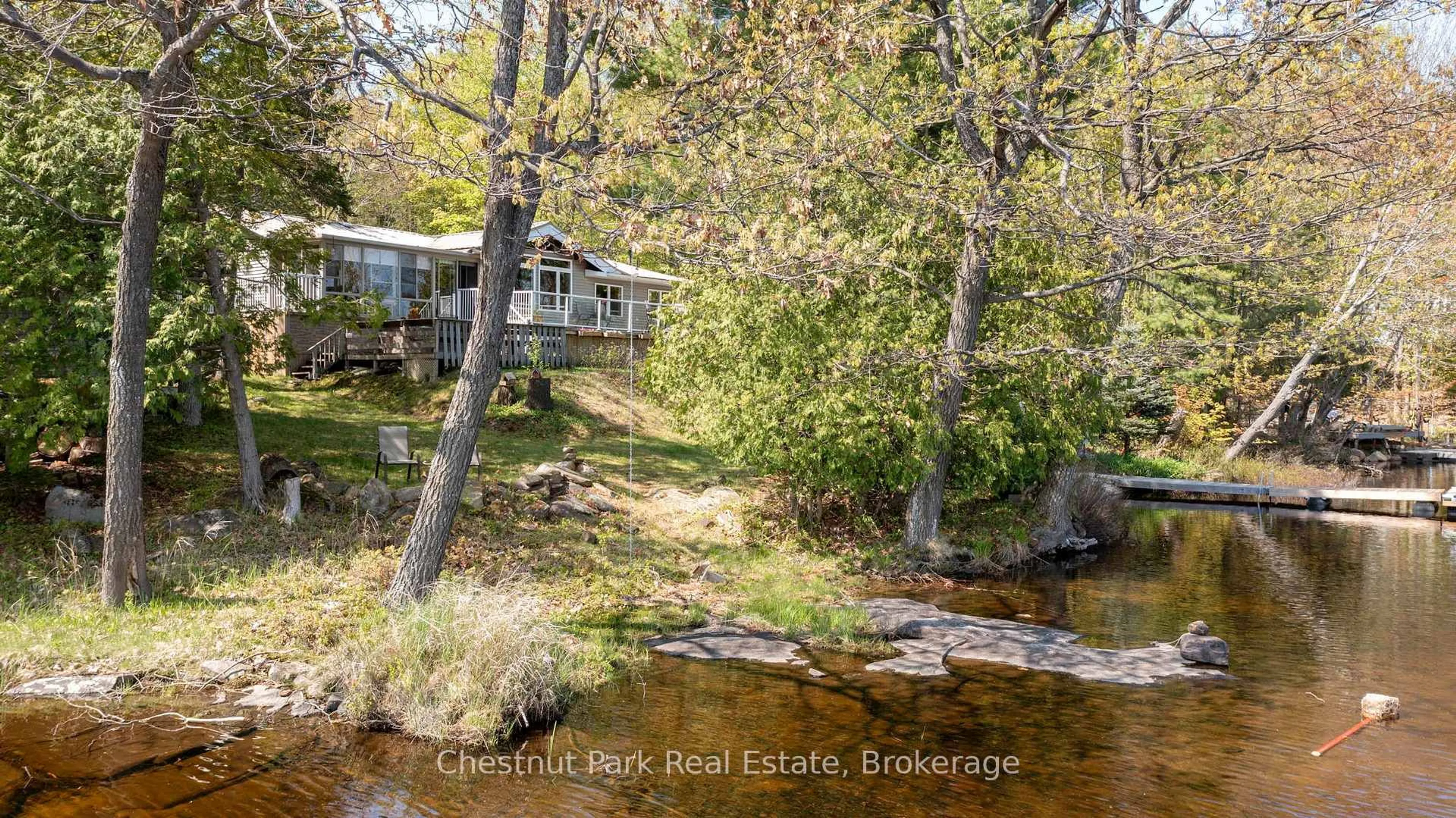 A pic from outside/outdoor area/front of a property/back of a property/a pic from drone, water/lake/river/ocean view for 1260 Winders Bay Rd, Lake of Bays Ontario P0B 1A0