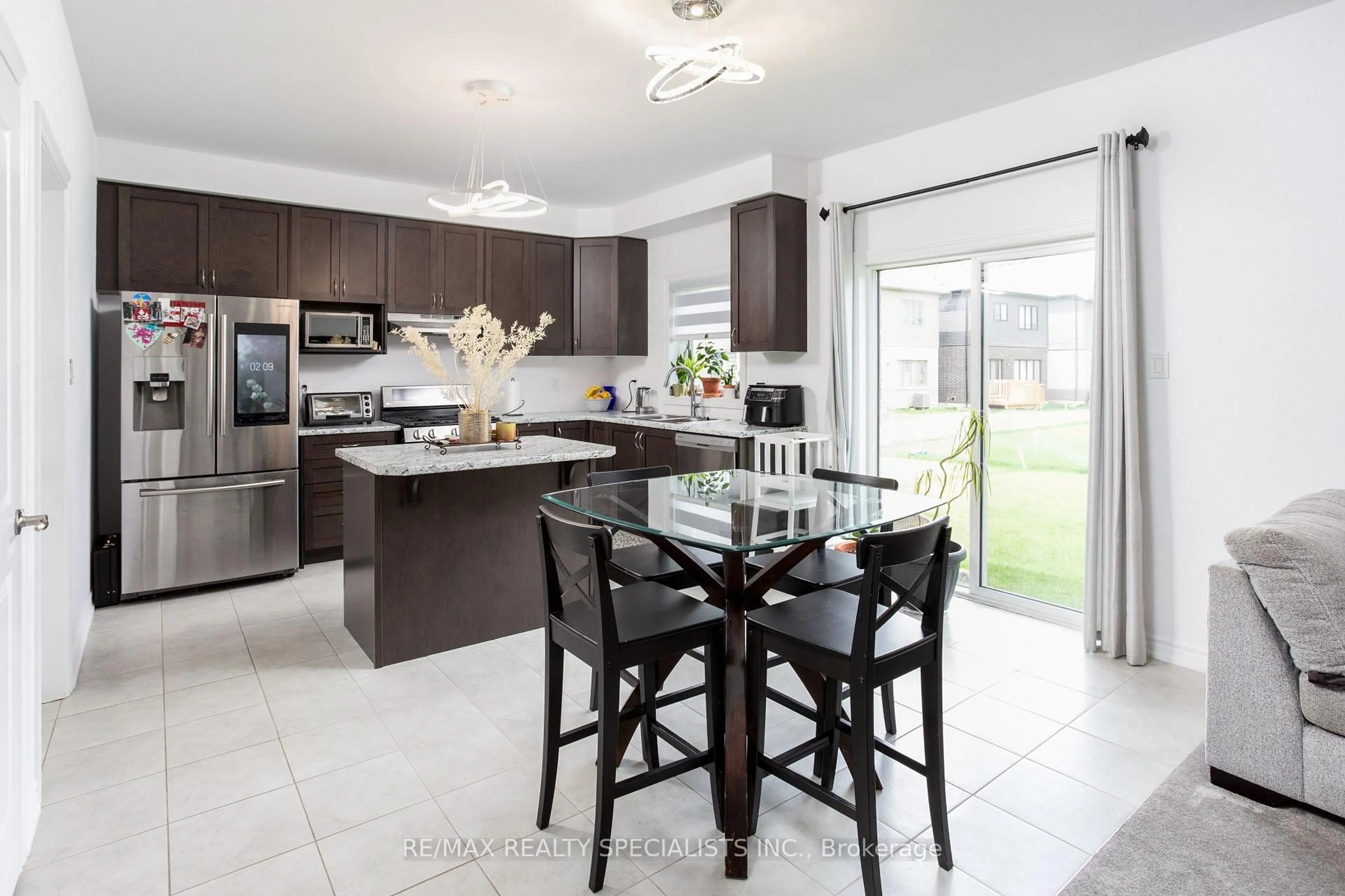 Open concept kitchen, ceramic/tile floor for 56 Stauffer Rd, Brantford Ontario N3V 0B4