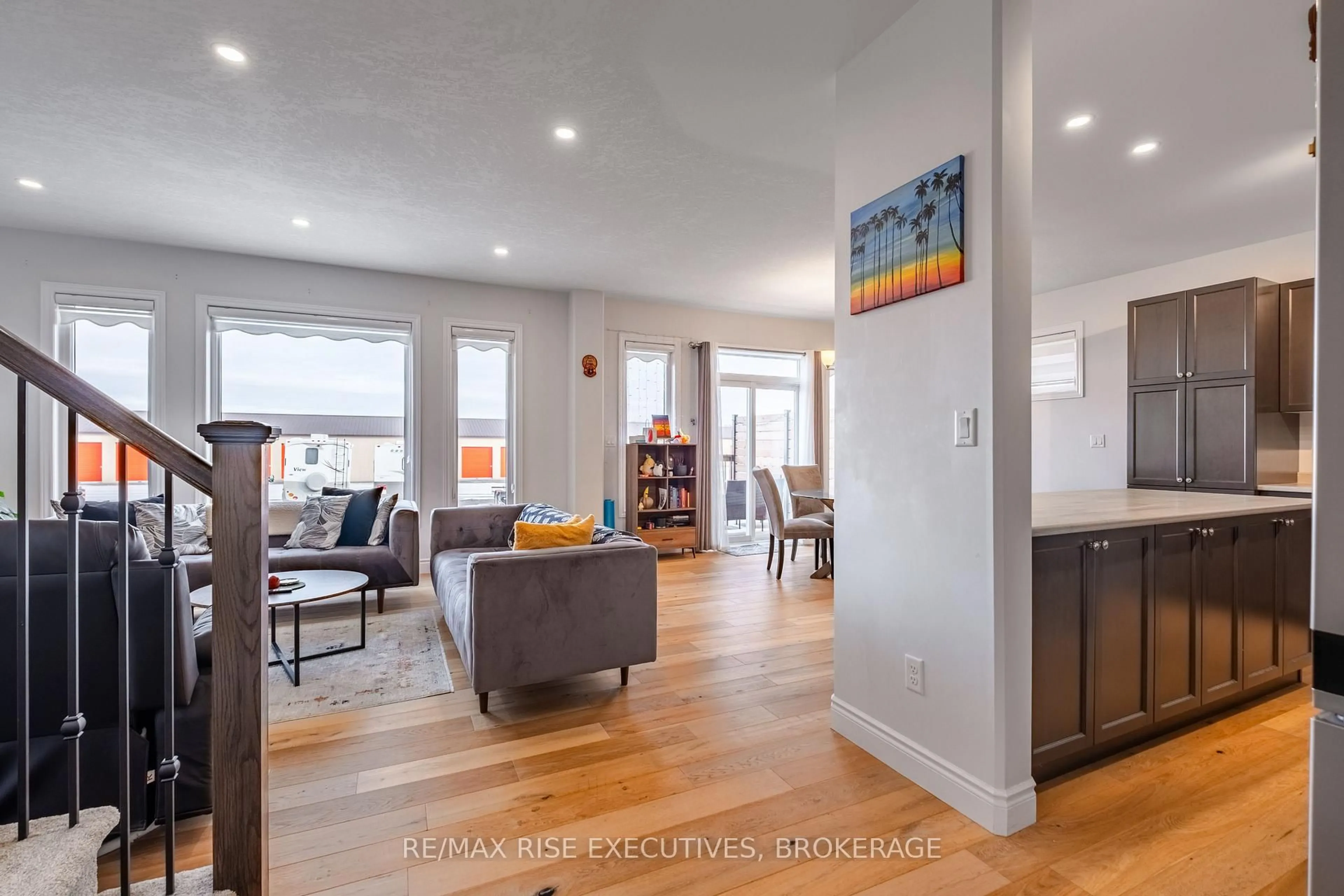Living room with furniture, wood/laminate floor for 260 Holden St, Kingston Ontario K7P 0L1