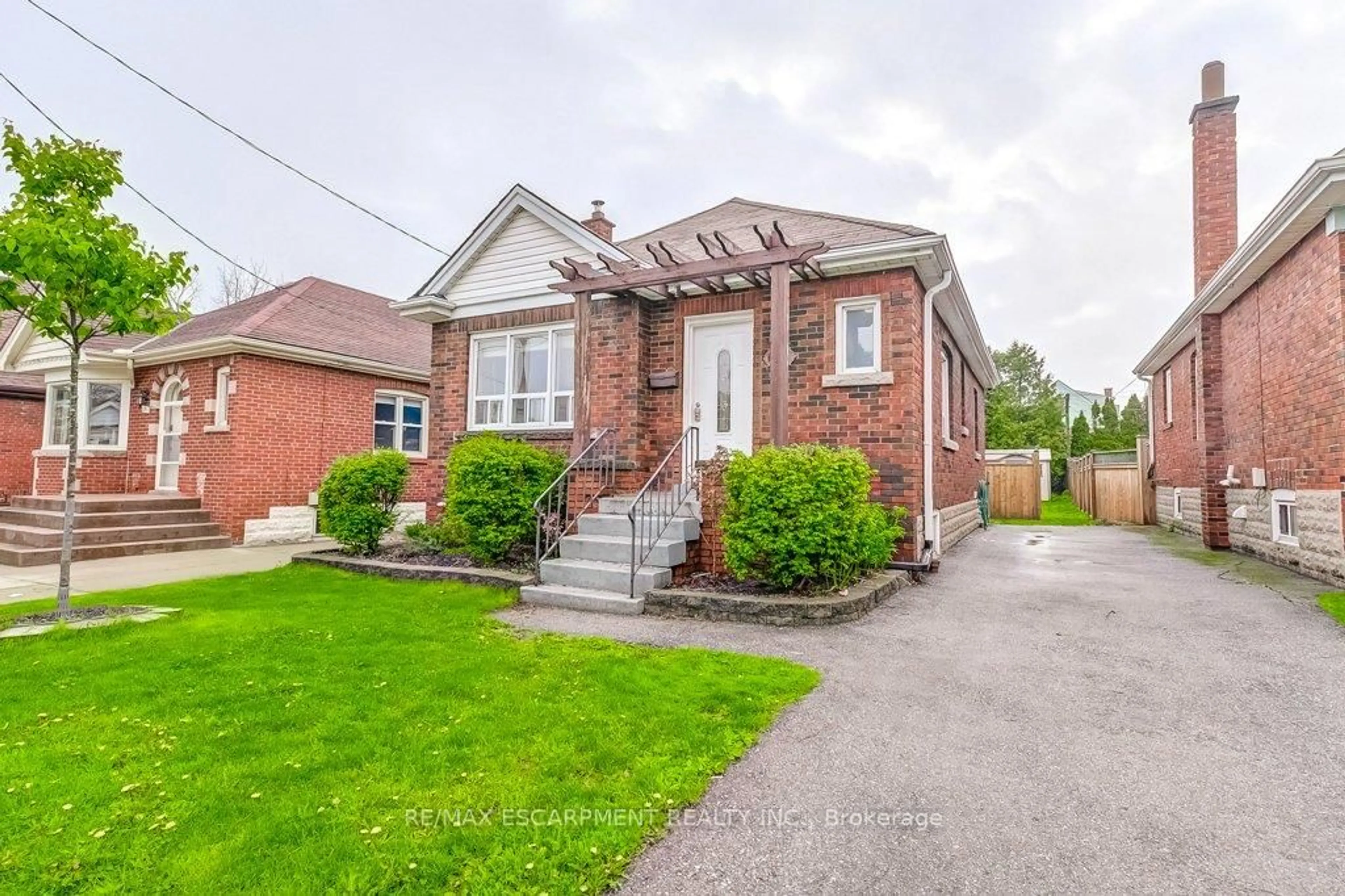 Home with brick exterior material, street for 127 BARONS Ave, Hamilton Ontario L8K 2Y8