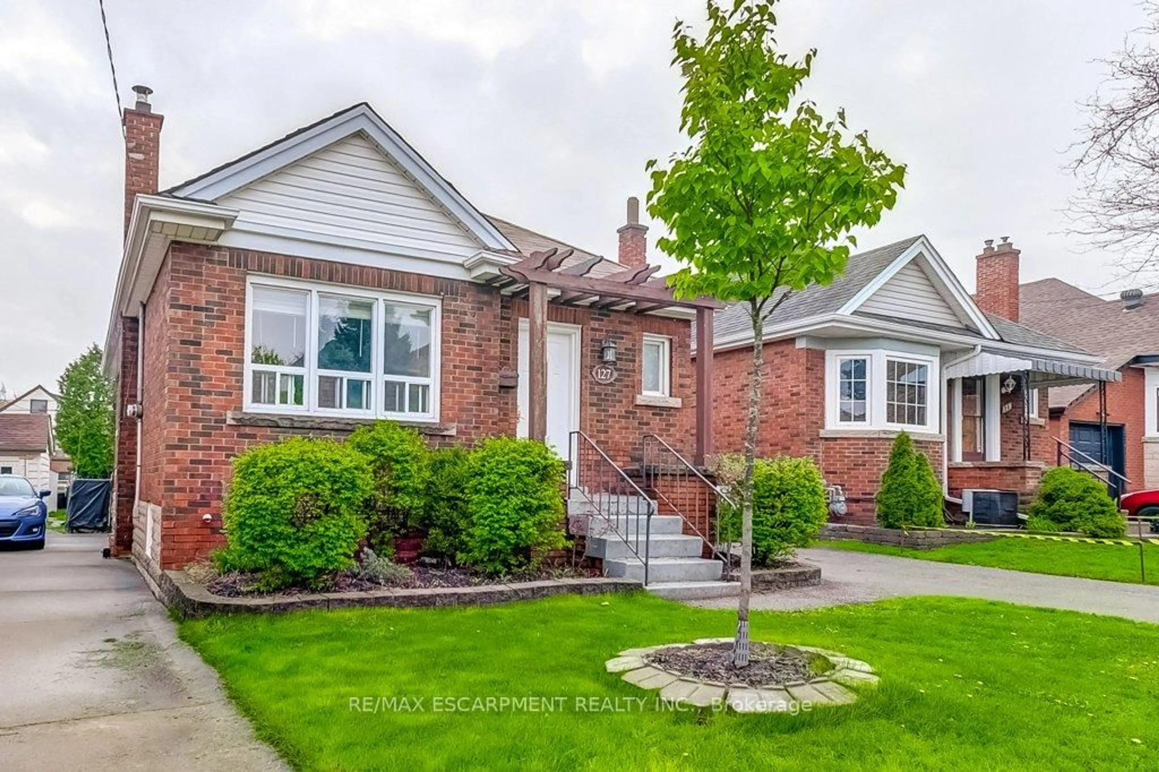Home with brick exterior material, street for 127 BARONS Ave, Hamilton Ontario L8K 2Y8