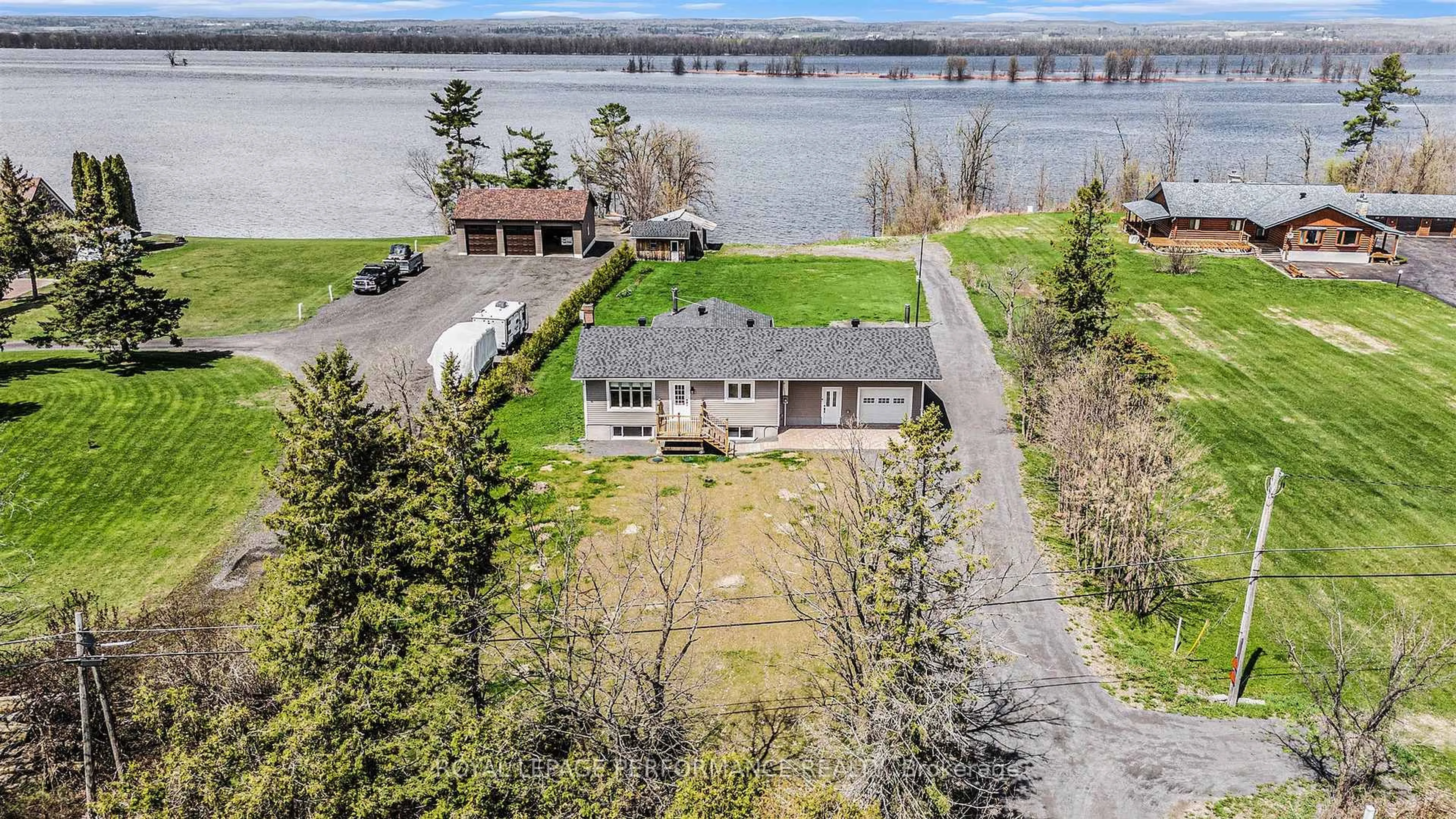 A pic from outside/outdoor area/front of a property/back of a property/a pic from drone, water/lake/river/ocean view for 9360 County Road 17 Rd, Clarence-Rockland Ontario K4K 1K9