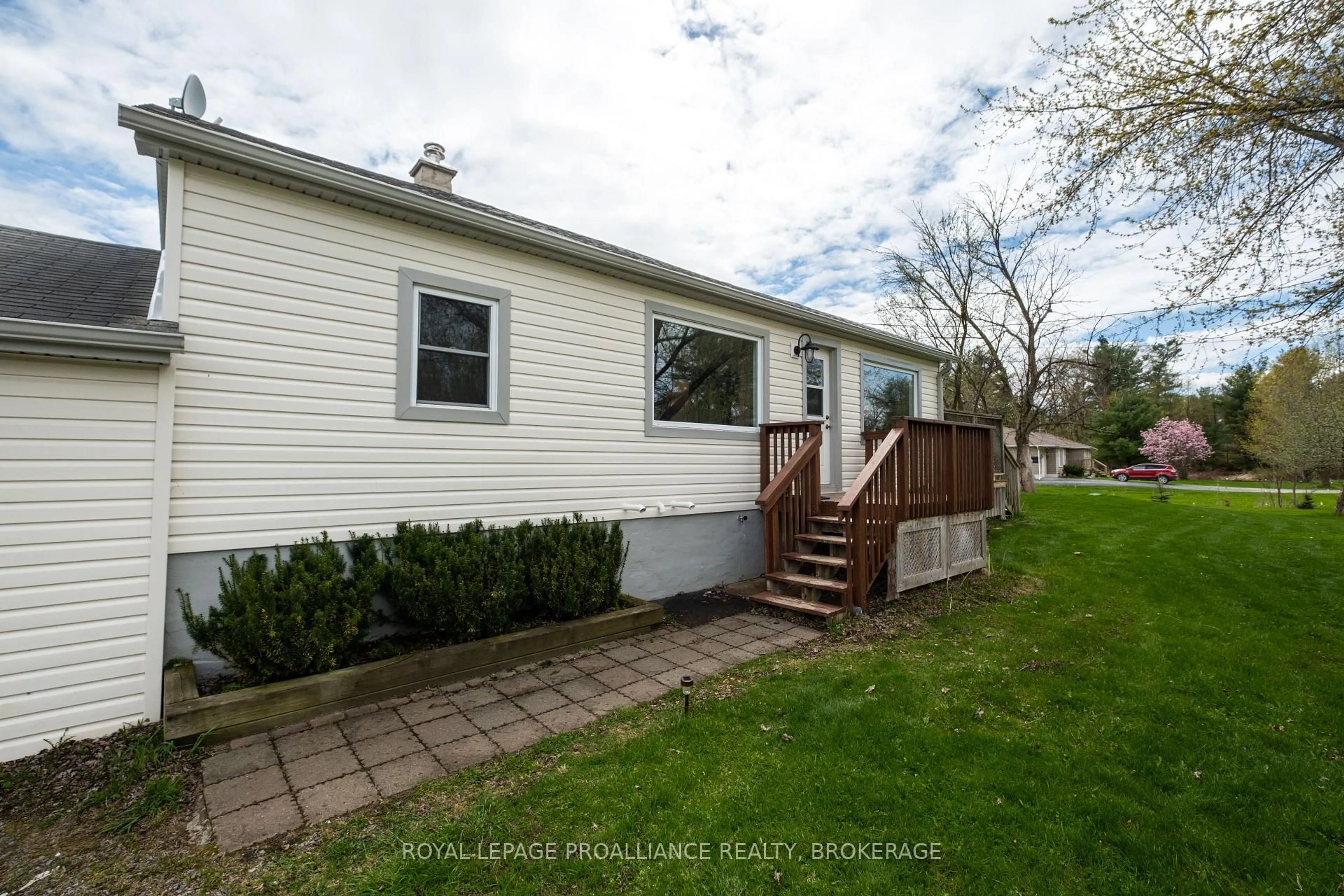 Home with vinyl exterior material, street for 5426 Battersea Rd, Battersea Ontario K0H 1H0