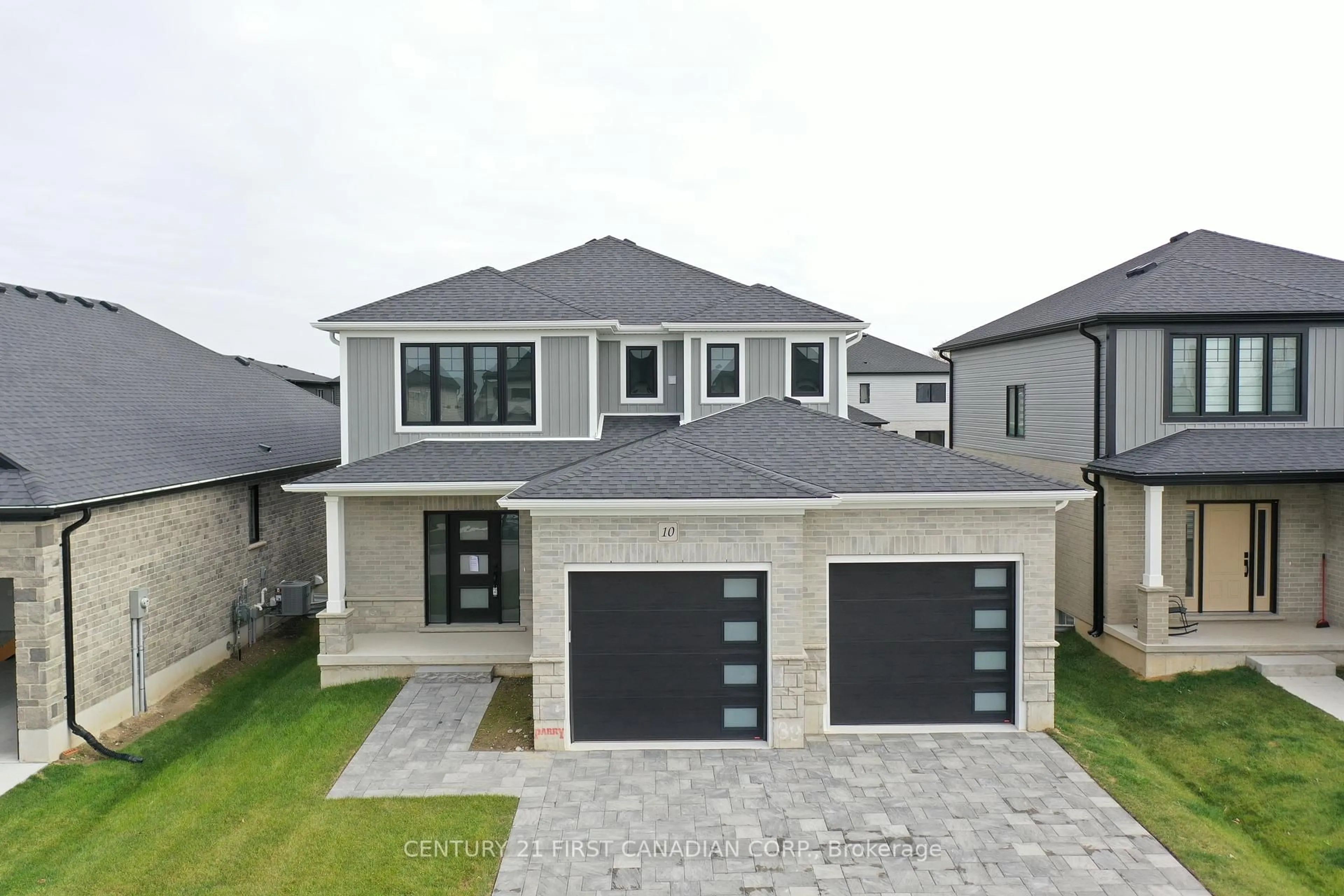 A pic from outside/outdoor area/front of a property/back of a property/a pic from drone, street for 113 Atkinson St, North Middlesex Ontario N0M 1A0