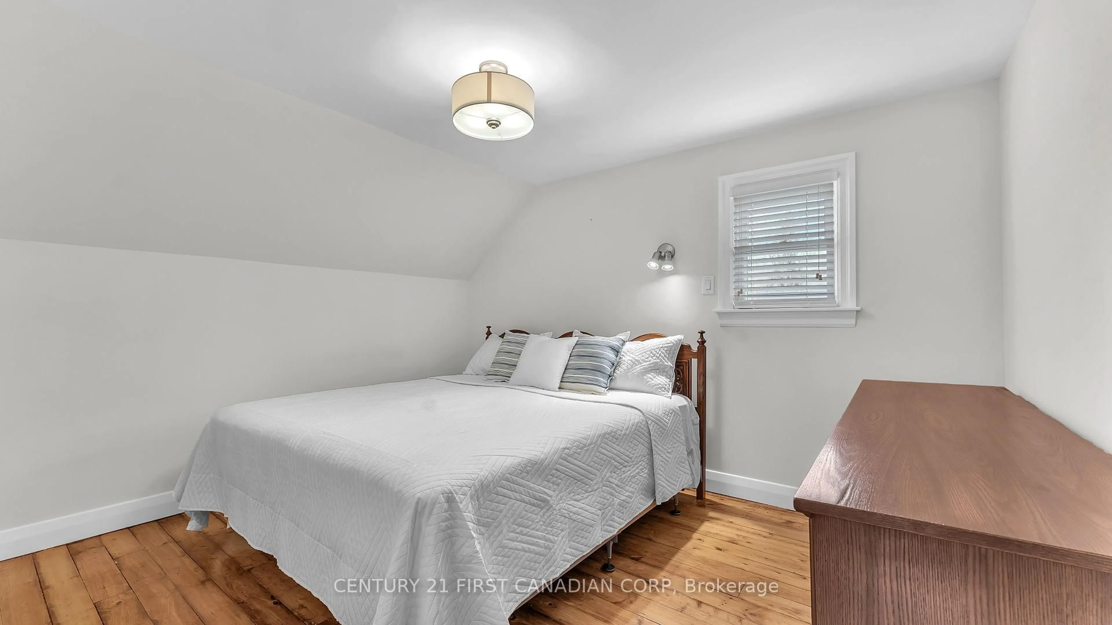 Bedroom with bed, wood/laminate floor for 47 Crescent Ave, Central Elgin Ontario N5P 2K4