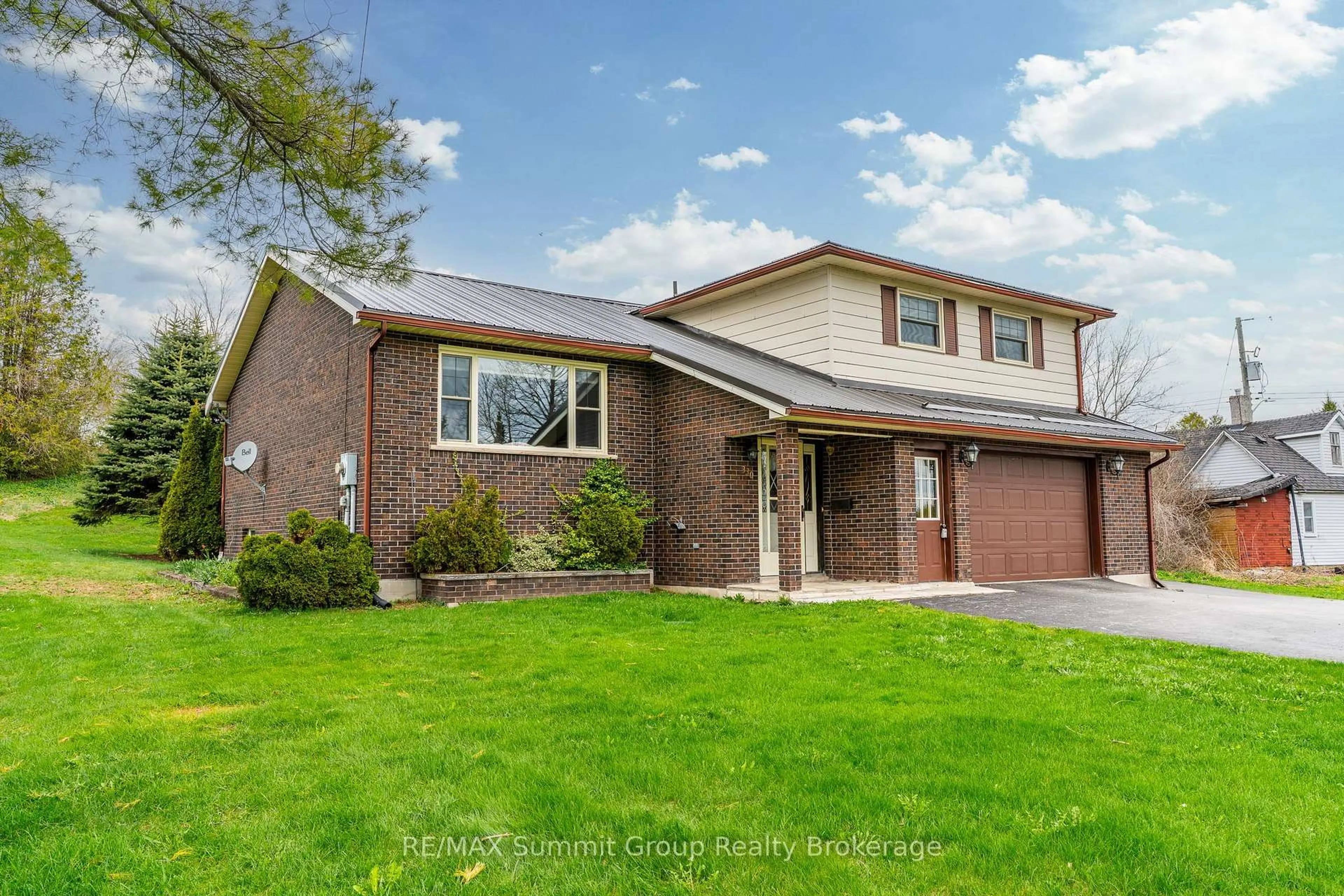 Home with brick exterior material, street for 330 MILL BRIDGE Rd, Grey Highlands Ontario N0C 1C0