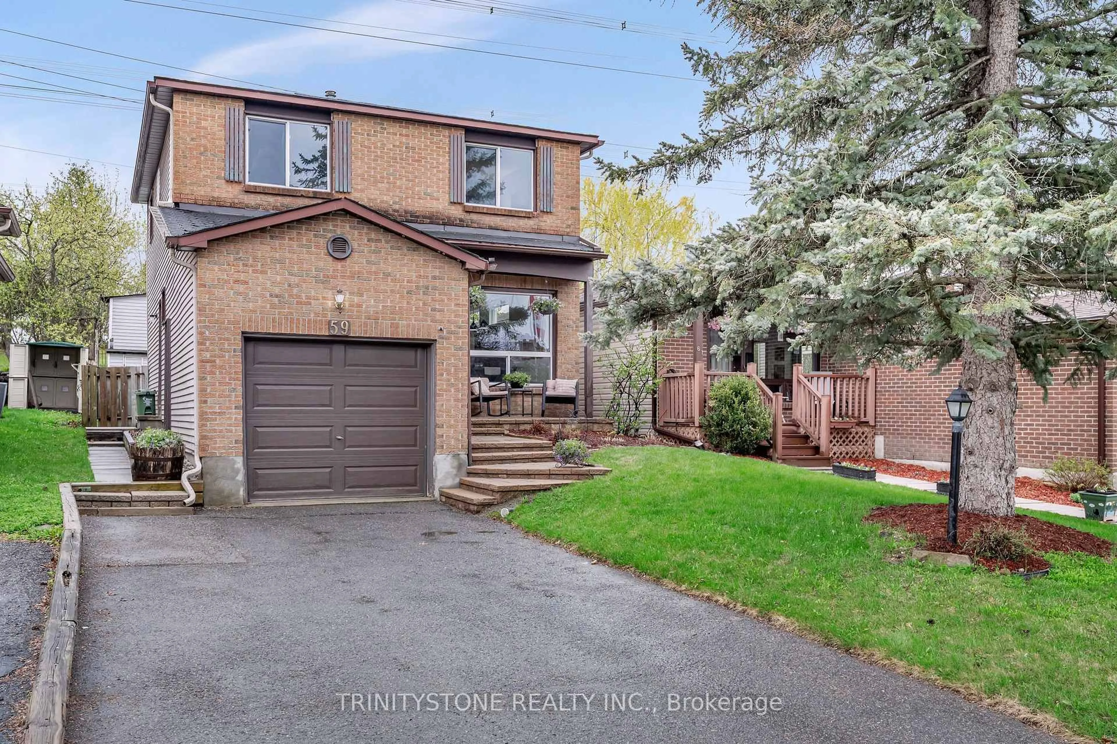 Home with brick exterior material, street for 59 Stable Way, Kanata Ontario K2M 1A8