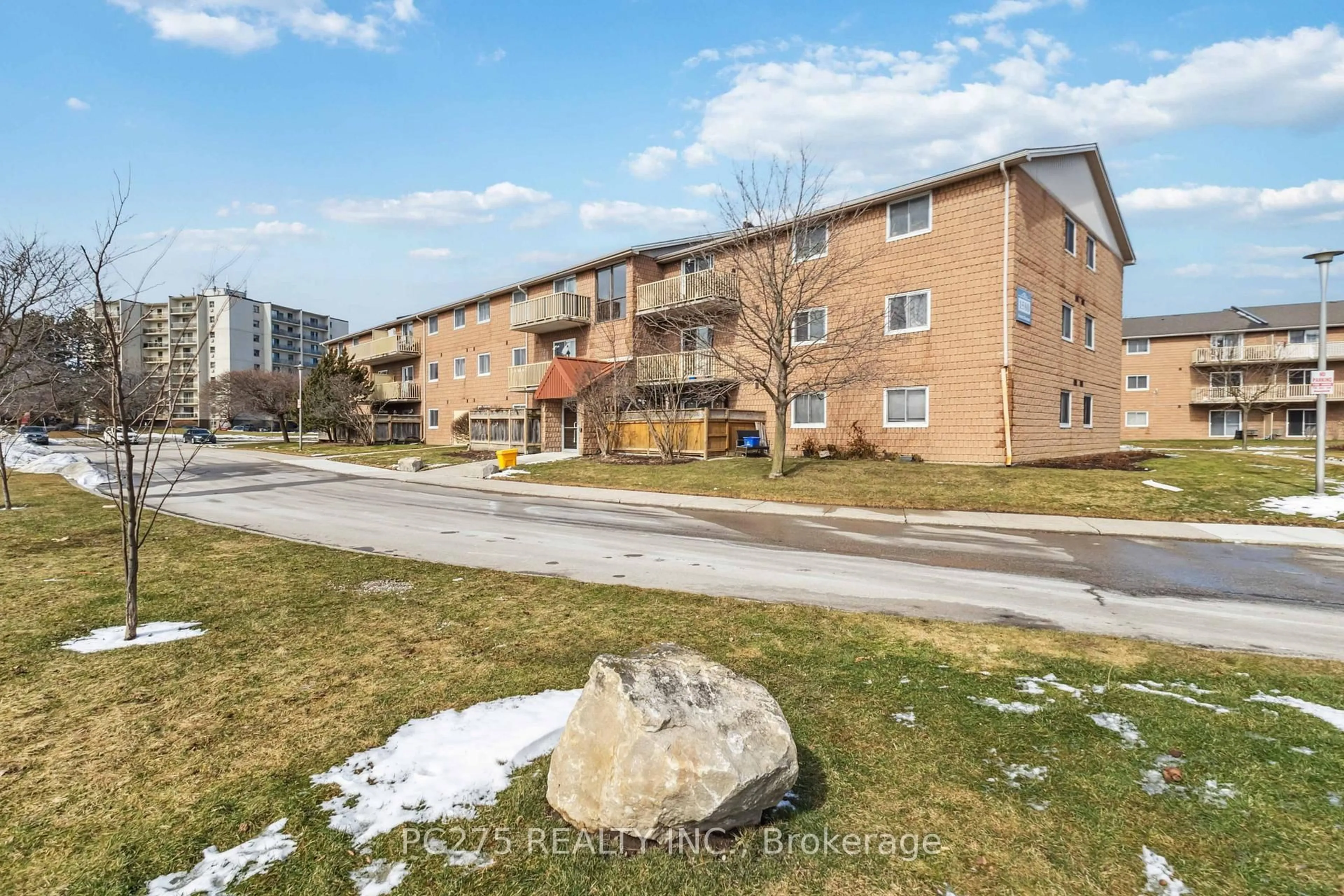 A pic from outside/outdoor area/front of a property/back of a property/a pic from drone, street for 1580 Ernest Ave #105, London South Ontario N6E 2T9