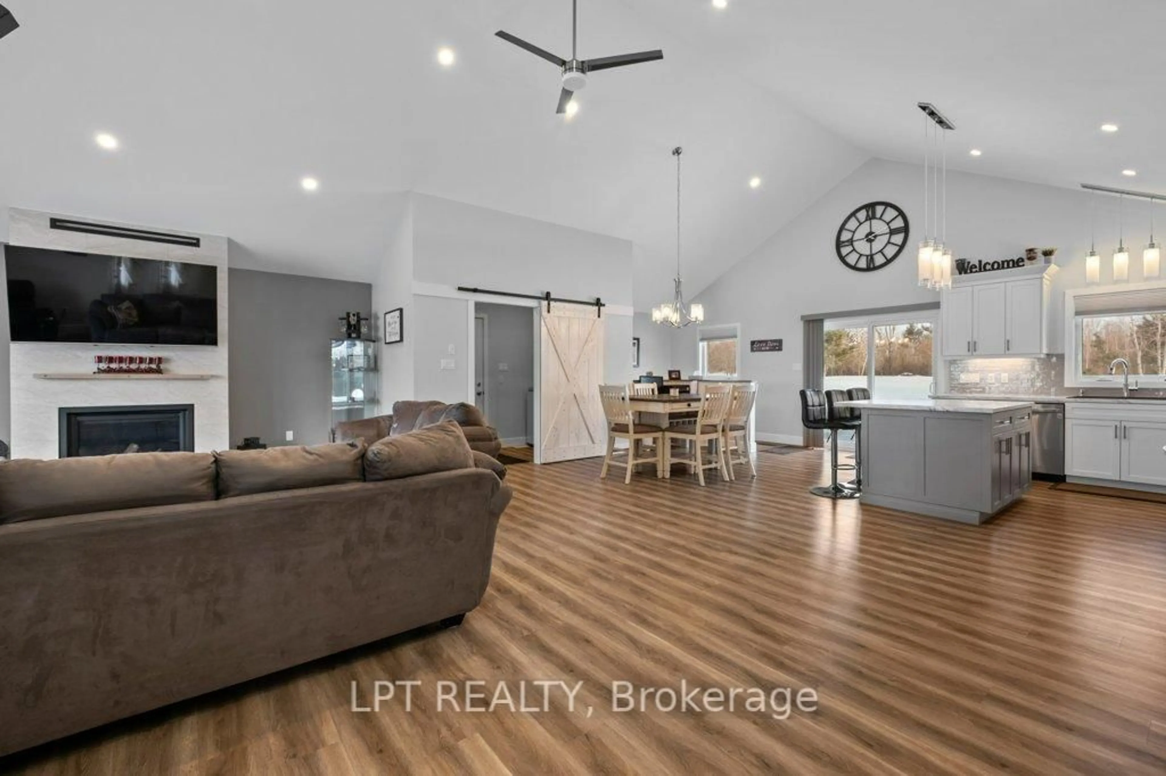 Open concept kitchen, wood/laminate floor for 9517 County Road 42 Rd, Rideau Lakes Ontario K0G 1X0