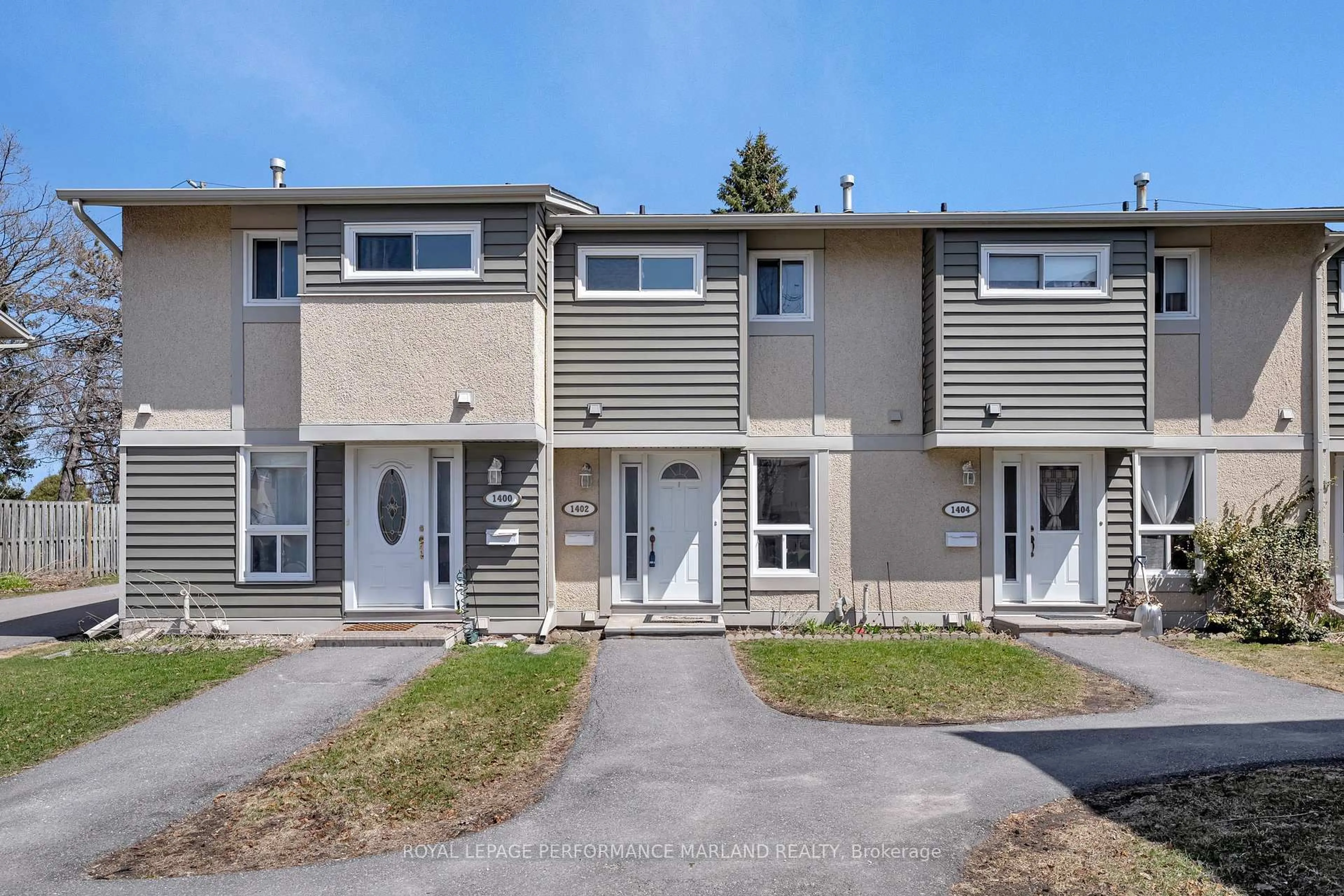 A pic from outside/outdoor area/front of a property/back of a property/a pic from drone, street for 1402 Ballard Crt #46, Ottawa Ontario K1B 4Z2