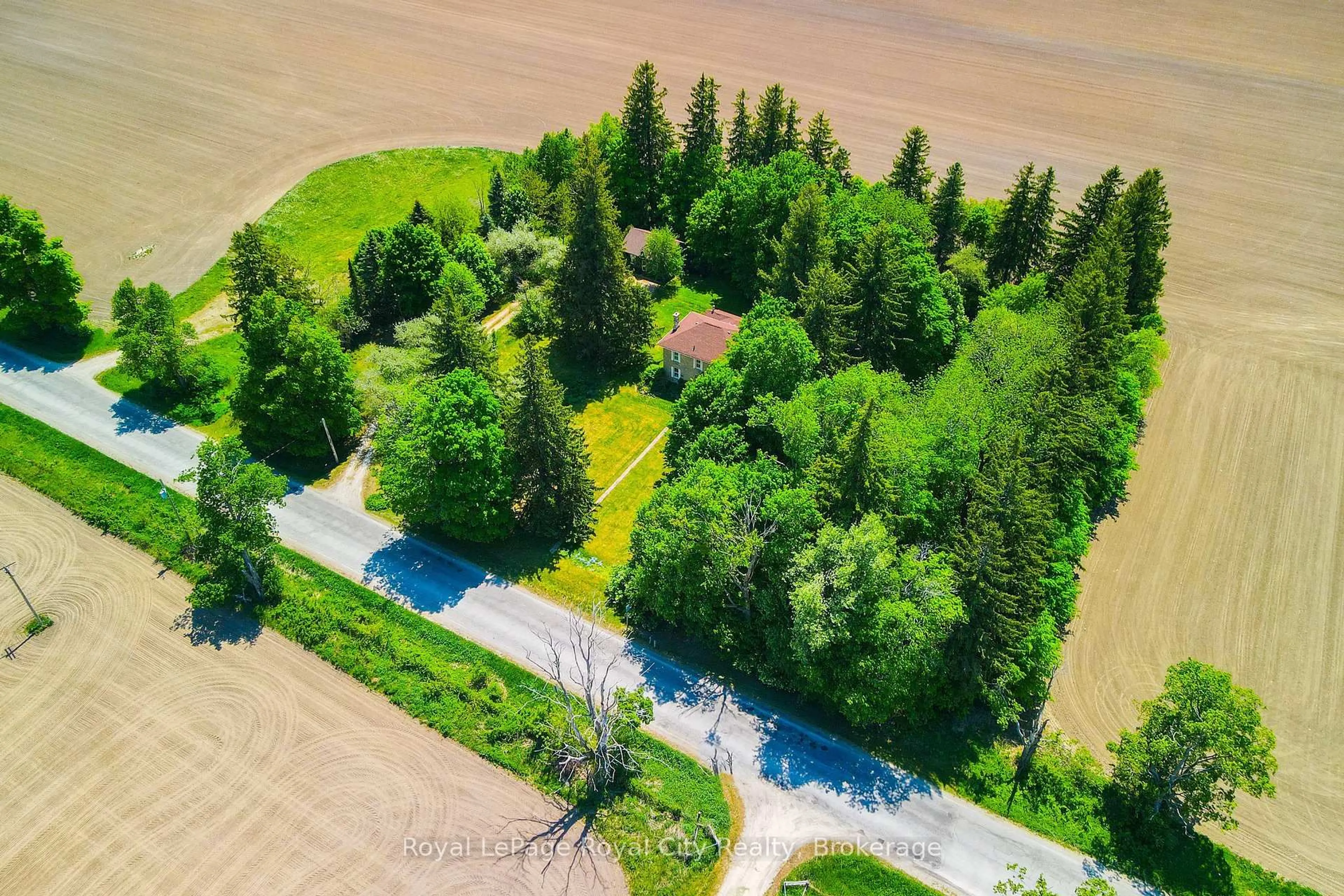 A pic from outside/outdoor area/front of a property/back of a property/a pic from drone, forest/trees view for 935 Scotland St, Centre Wellington Ontario N1M 3R9