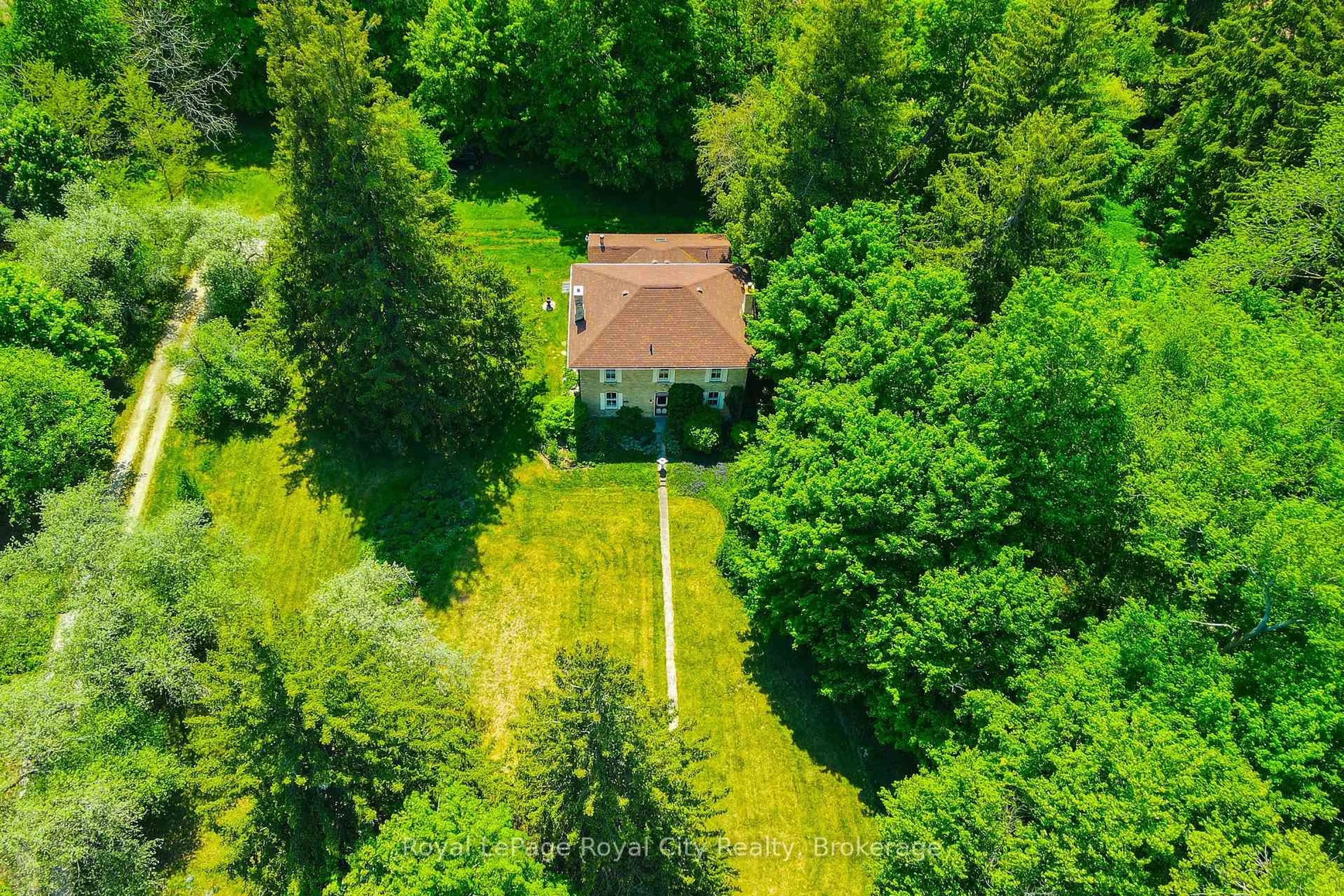 A pic from outside/outdoor area/front of a property/back of a property/a pic from drone, forest/trees view for 935 Scotland St, Centre Wellington Ontario N1M 3R9