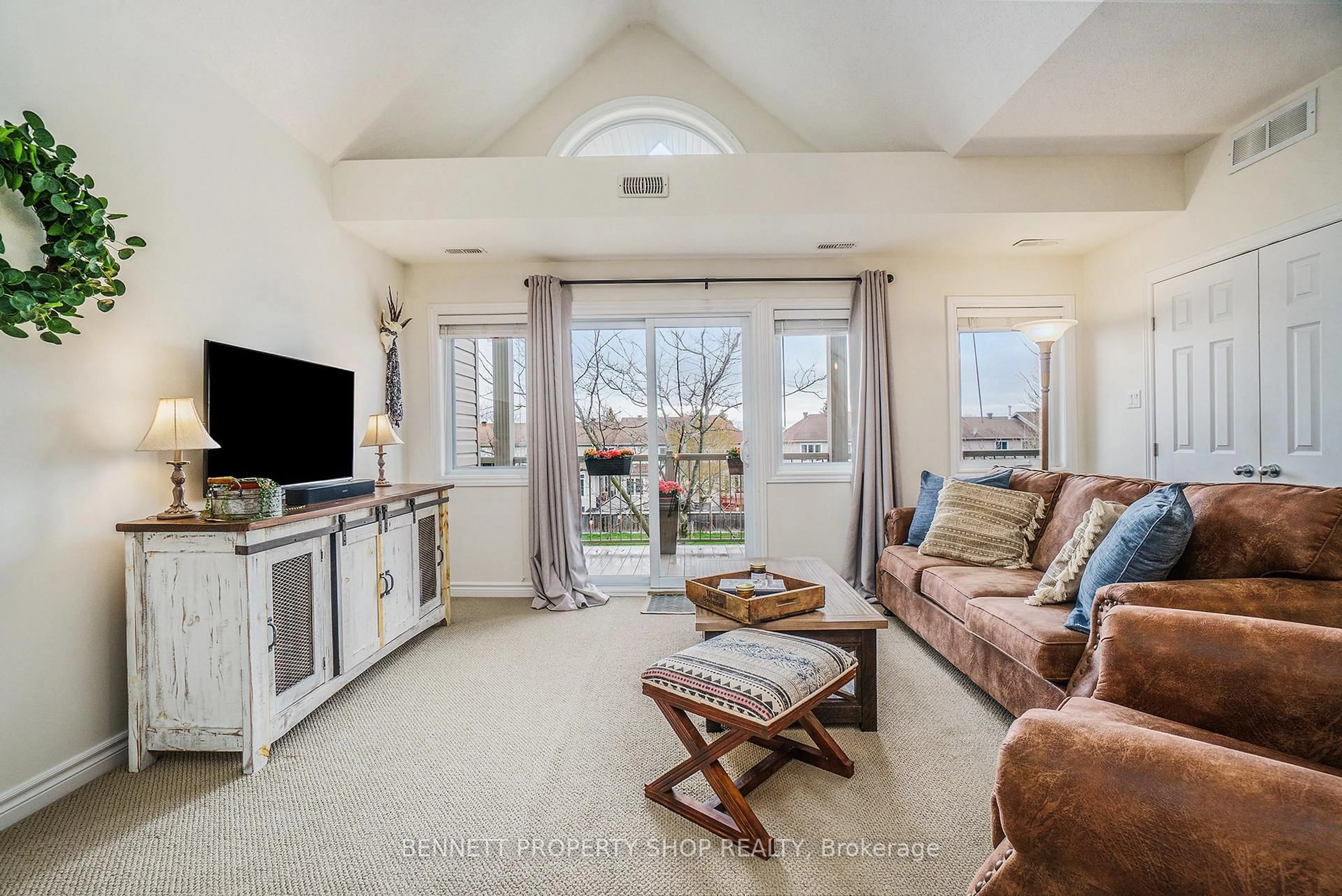 Living room with furniture, ceramic/tile floor for 99 Crestway Dr Dr #F, Ottawa Ontario K2G 7C6