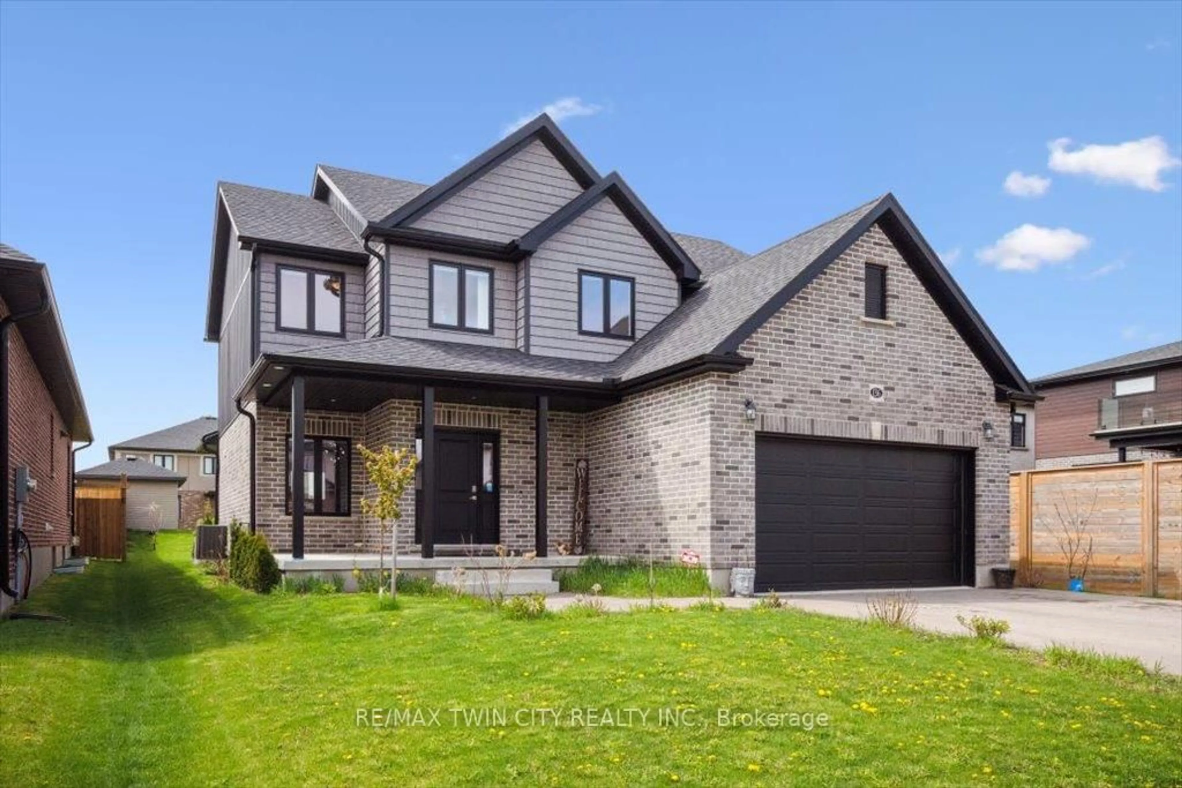 Home with brick exterior material, street for 136 Village Rd, Wellesley Ontario N0B 2T0