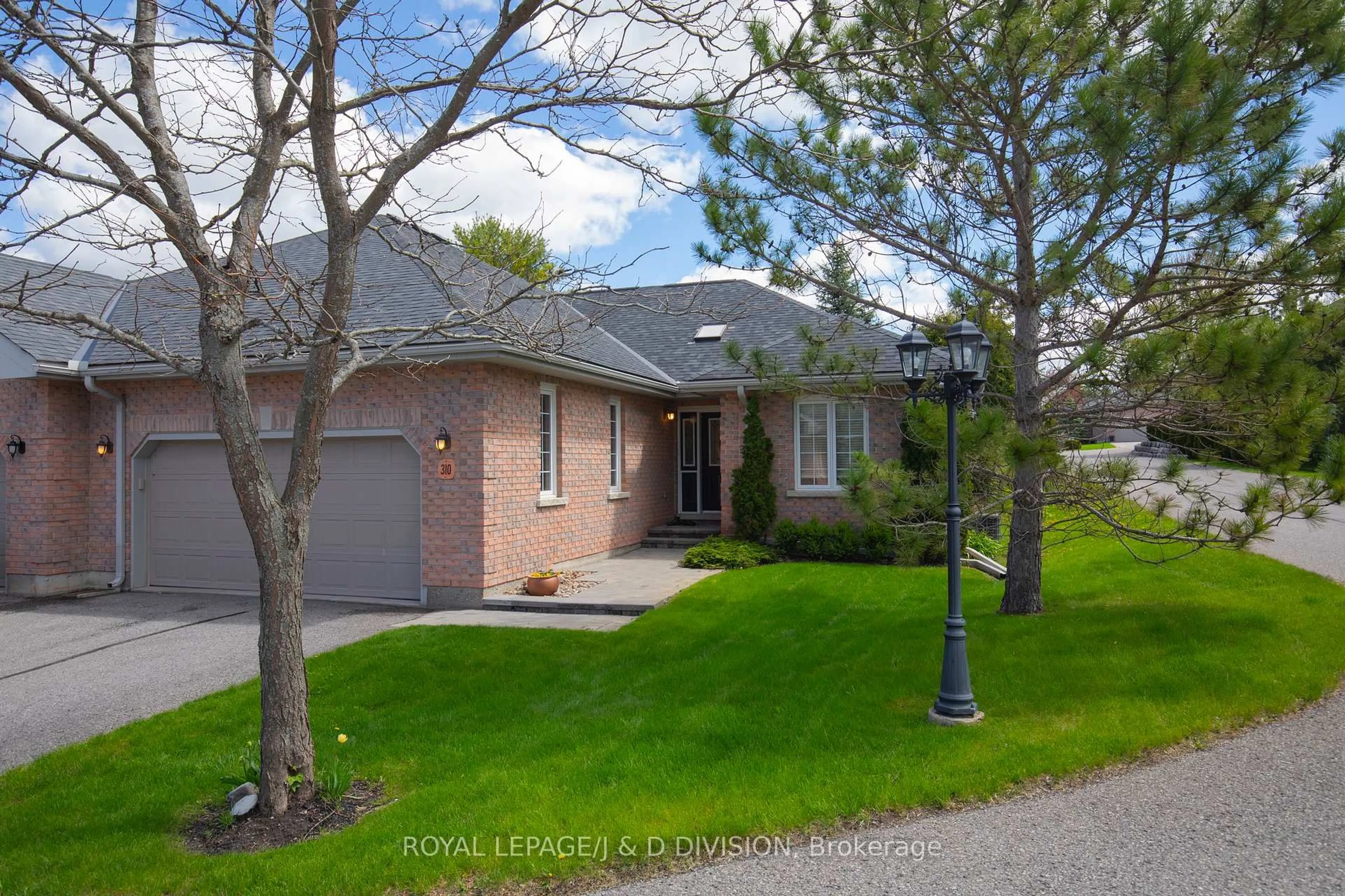 Home with brick exterior material, street for 1742 Ravenwood Dr #310, Peterborough West Ontario K9K 2R5