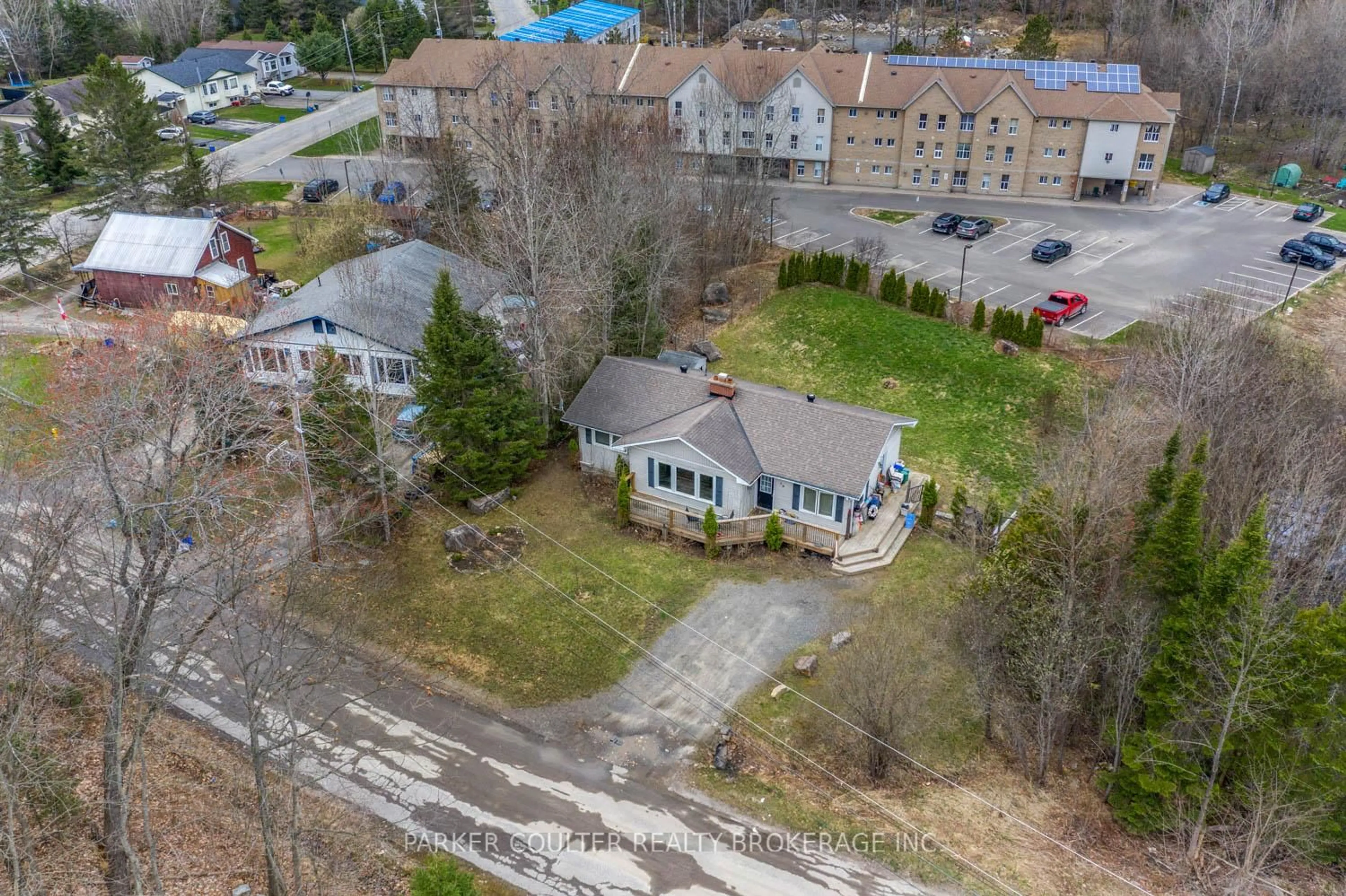 A pic from outside/outdoor area/front of a property/back of a property/a pic from drone, street for 28 Shay Rd, Huntsville Ontario P1H 1L2