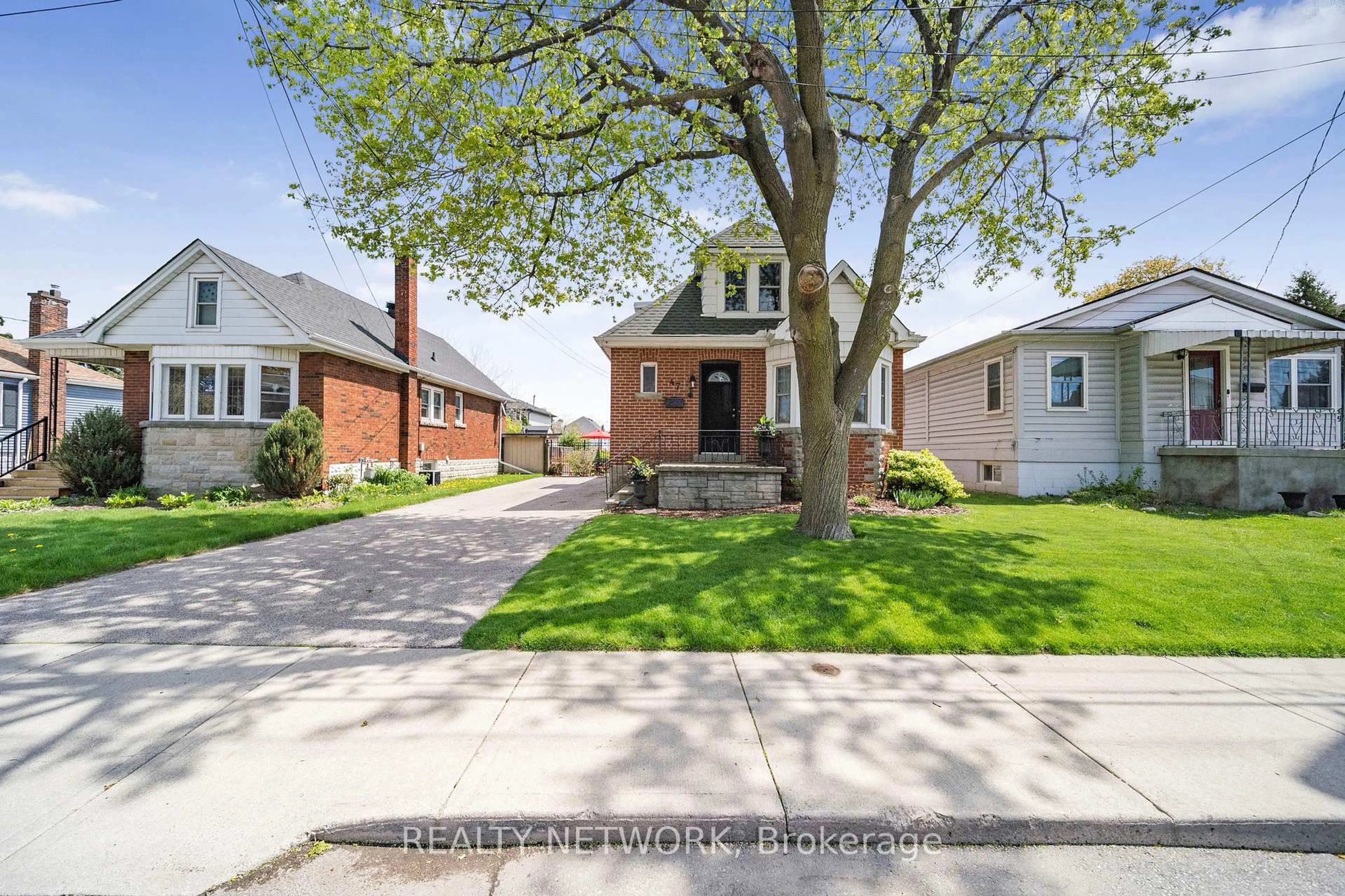 Home with brick exterior material, street for 47 East 15th St, Hamilton Ontario L9A 4E6