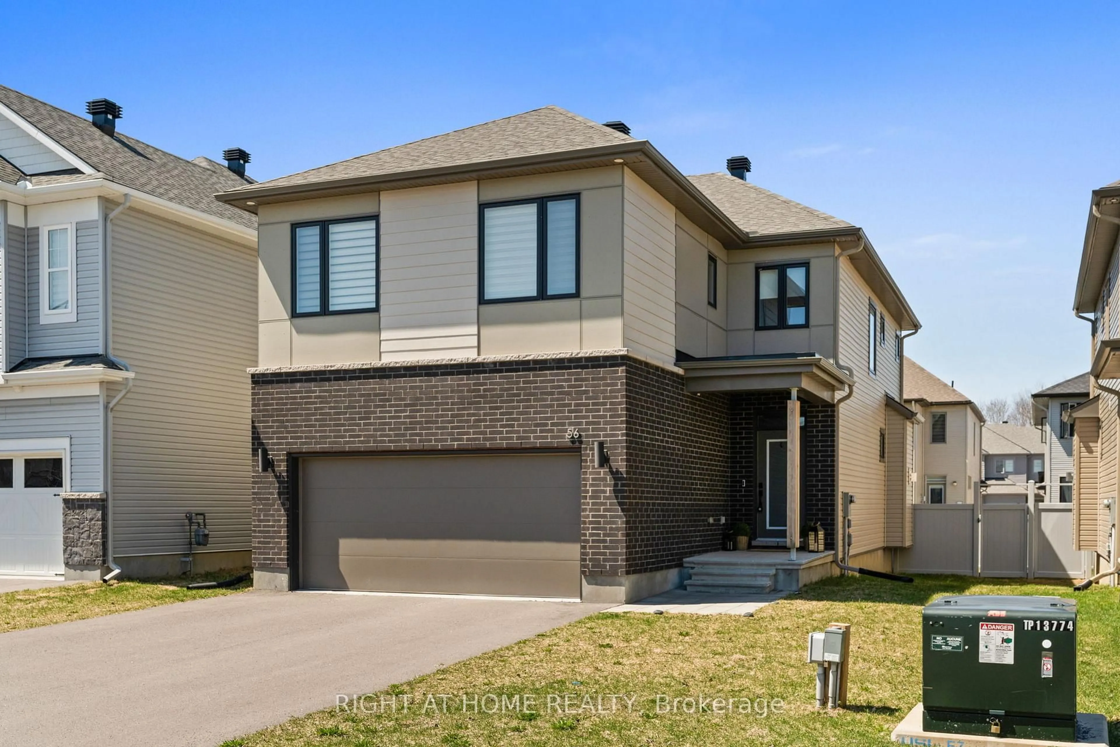 Home with brick exterior material, street for 56 Viceroy Mews N/A, Ottawa Ontario K1X 0J5