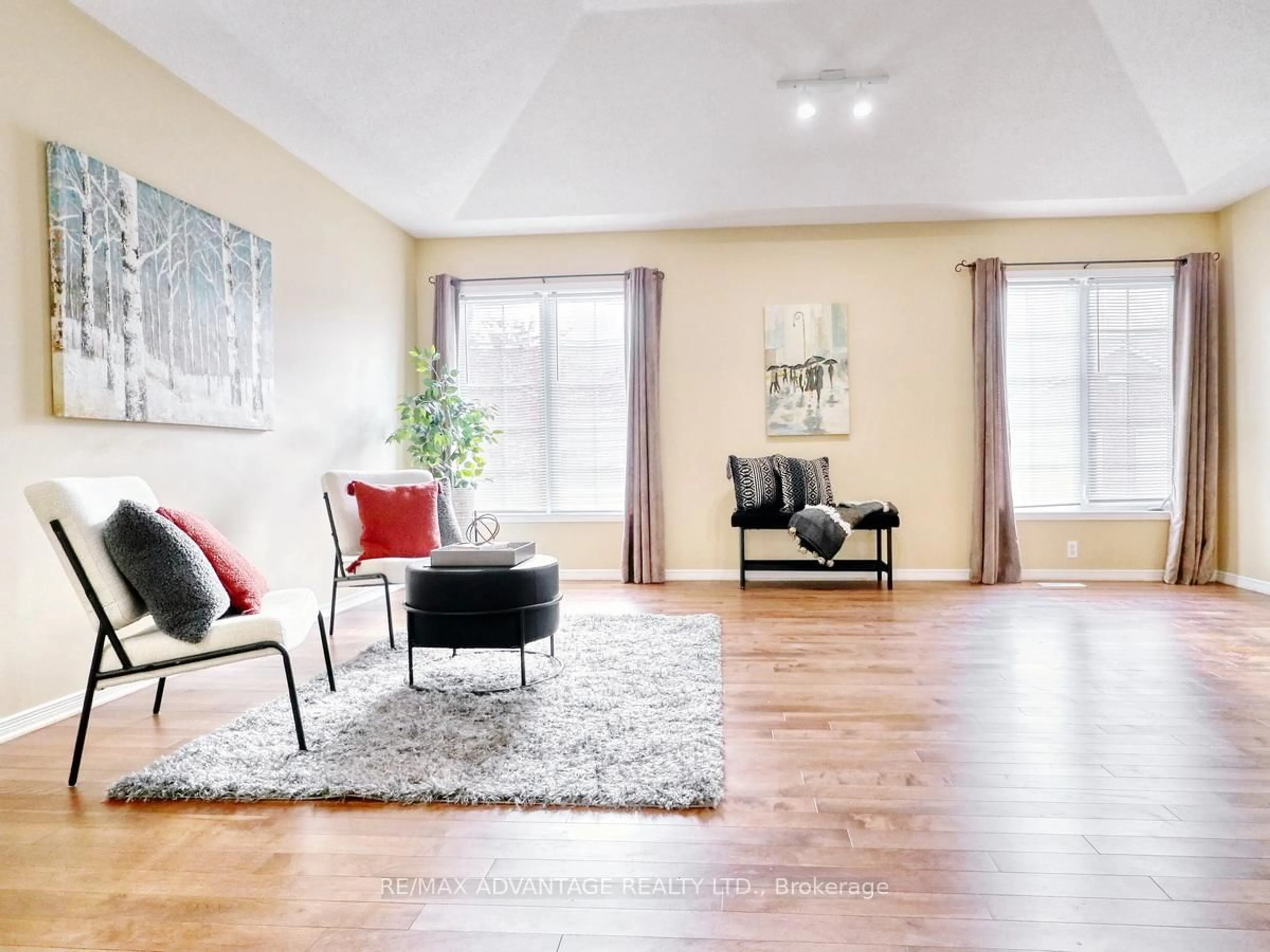 Living room with furniture, wood/laminate floor for 100 Stroud Cres #14, London South Ontario N6E 4A1