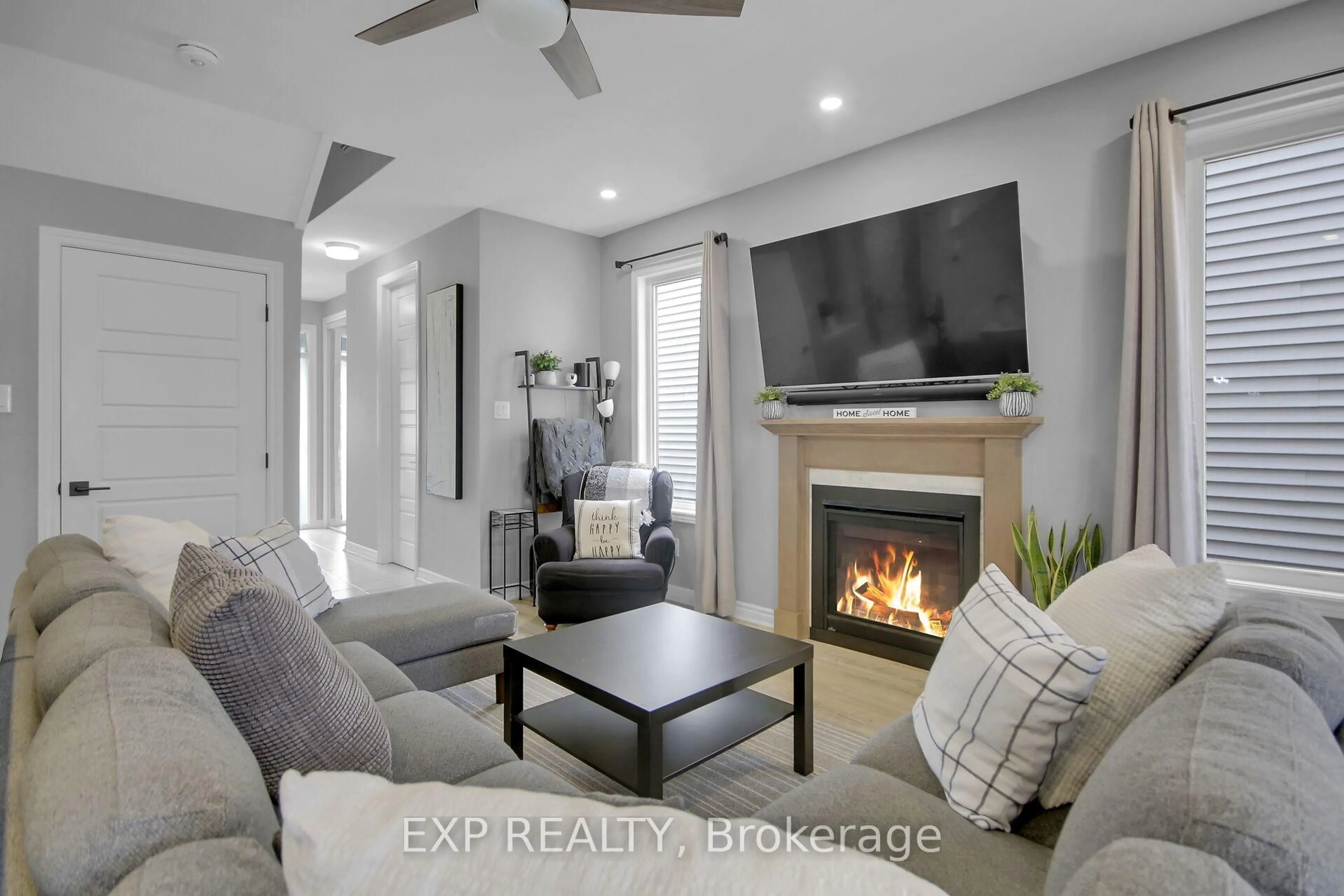 Living room with furniture, ceramic/tile floor for 758 Derreen Ave, Ottawa Ontario K2S 2Z1