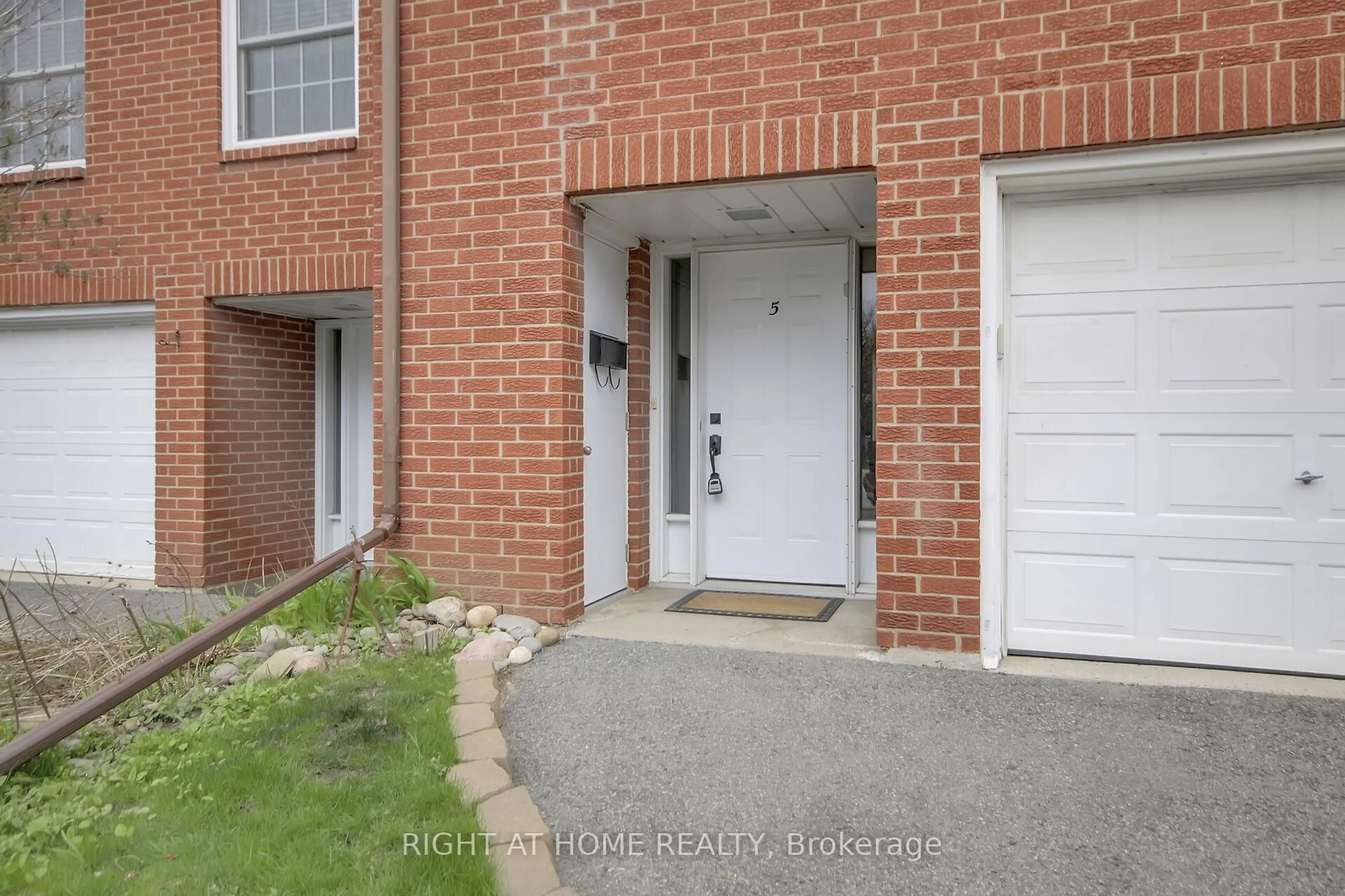 Home with brick exterior material, street for 5 Moorside Private, Ottawa Ontario K2C 3P4